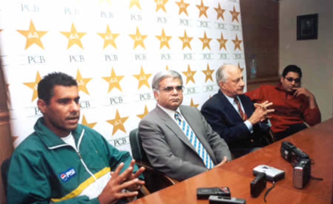 Pakistan captain Waqar Younis answers a question during a press conference on the eve of team's departure for South Africa for the 2003 ICC Cricket World Cup. PCB Director Chishty Mujahid, team manager Shaharyar Khan and vice-captain Inzamam-ul-Haq also attended the press conference.