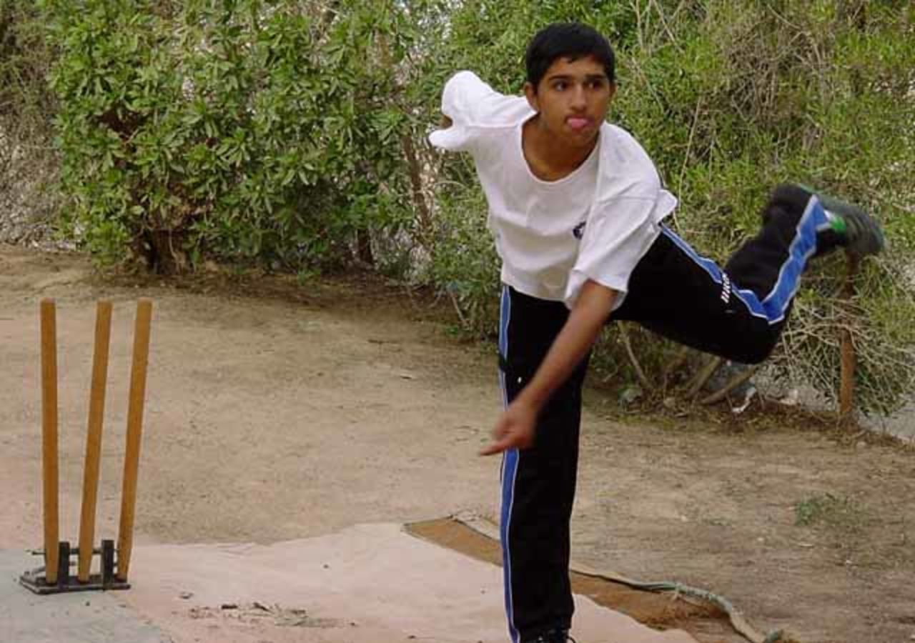 Left arm spinner Solomon Varsulker in bowling stride