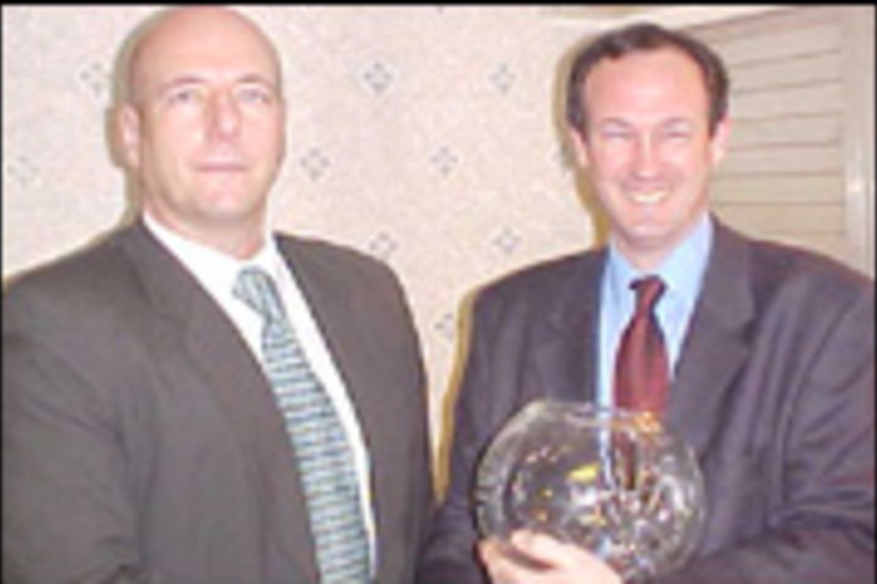 Haslingden Chairman Mark Rothwell presents Graham Dakin with his retirement momento