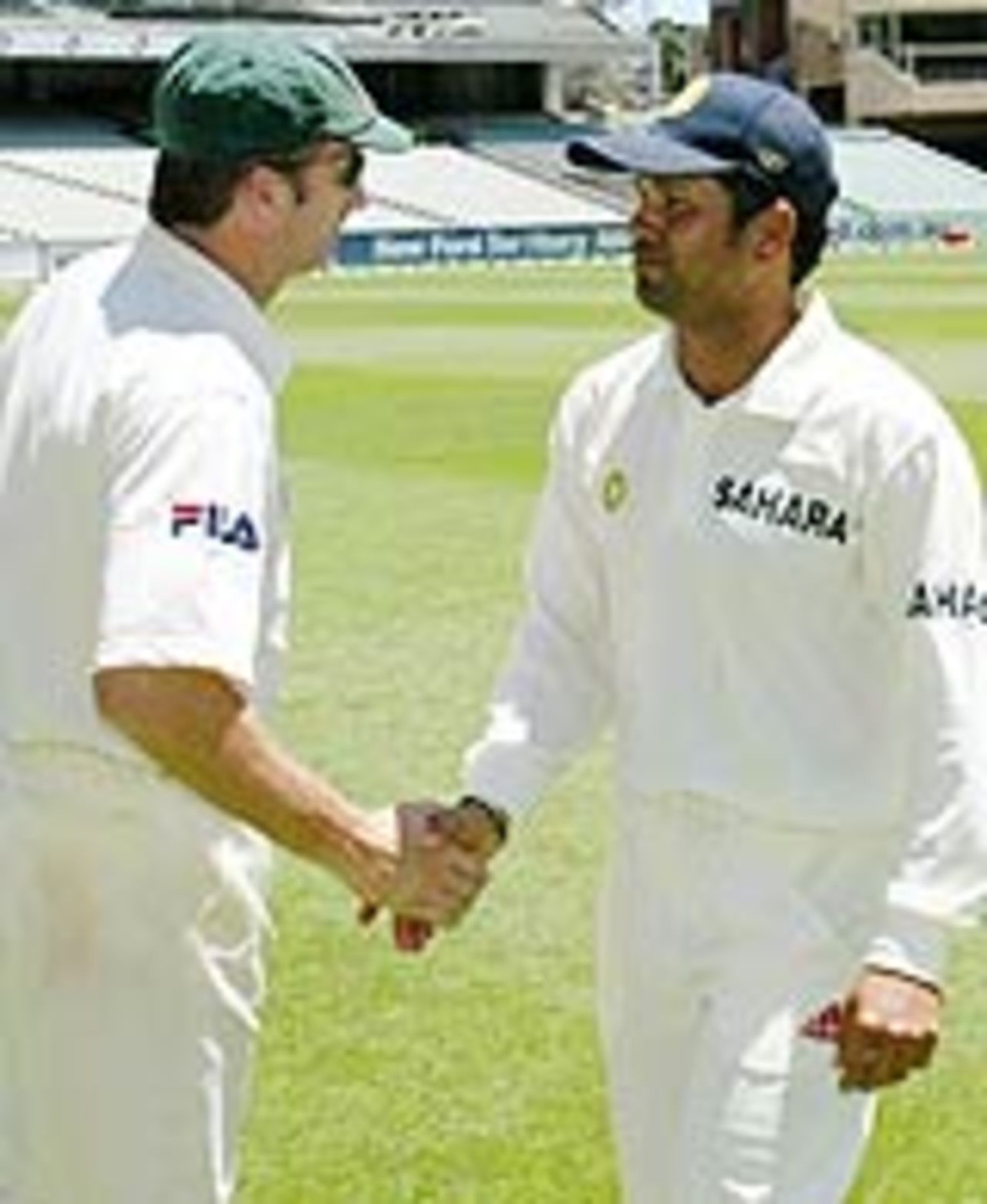 Steve Waugh commiserates with a disappointed Sachin Tendulkar, Australia v India, 3rd Test, Melbourne, 5th day