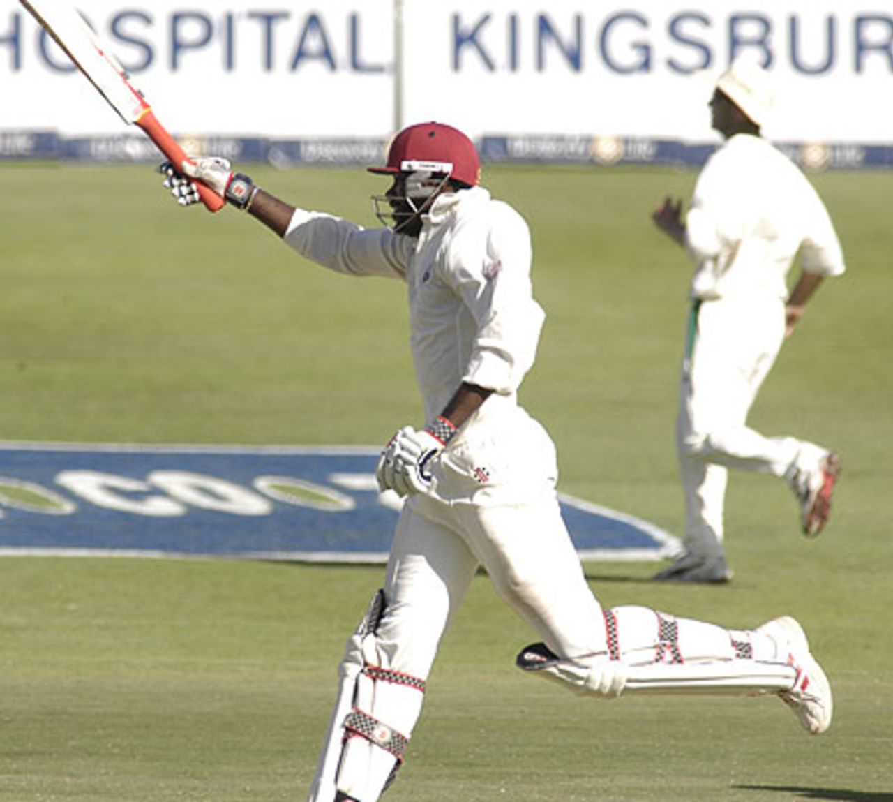 Chris Gayle completes his century during the third test against the South Africa at Newlands on Saturday