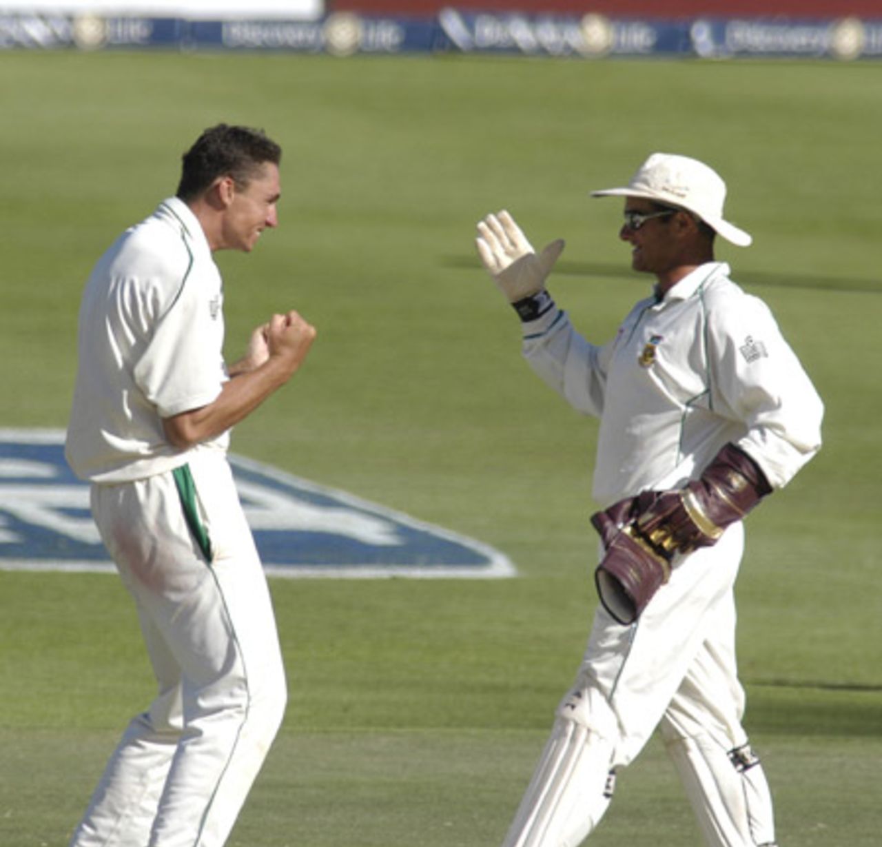 Andre Nel celebrates his first five wicket test haul with Mark Boucher at Newlands during the 3rd test match