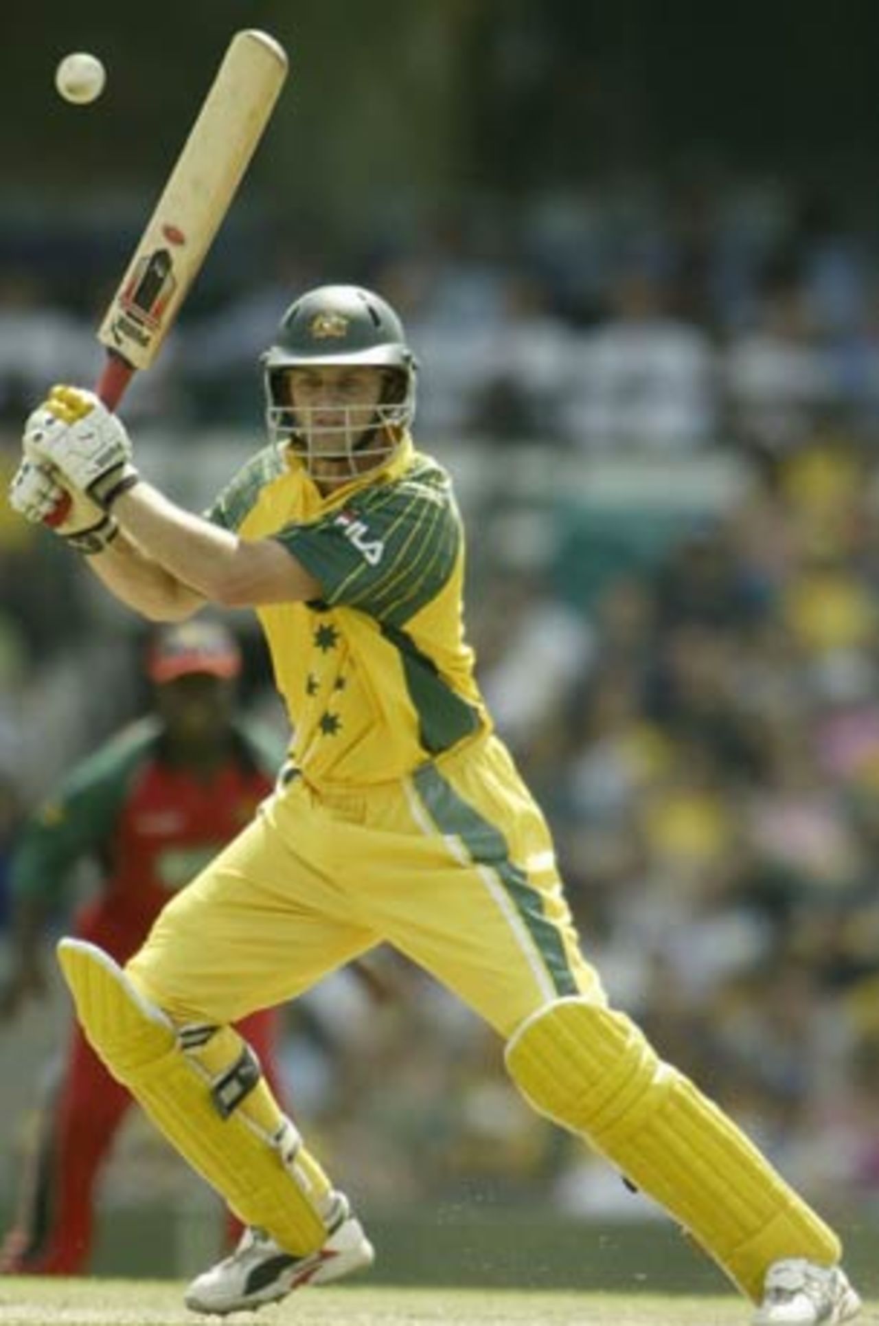 Adam Gilchrist drives square on the off side, Australia v Zimbabwe, VB Series, 2nd ODI, Sydney, January 11, 2004
