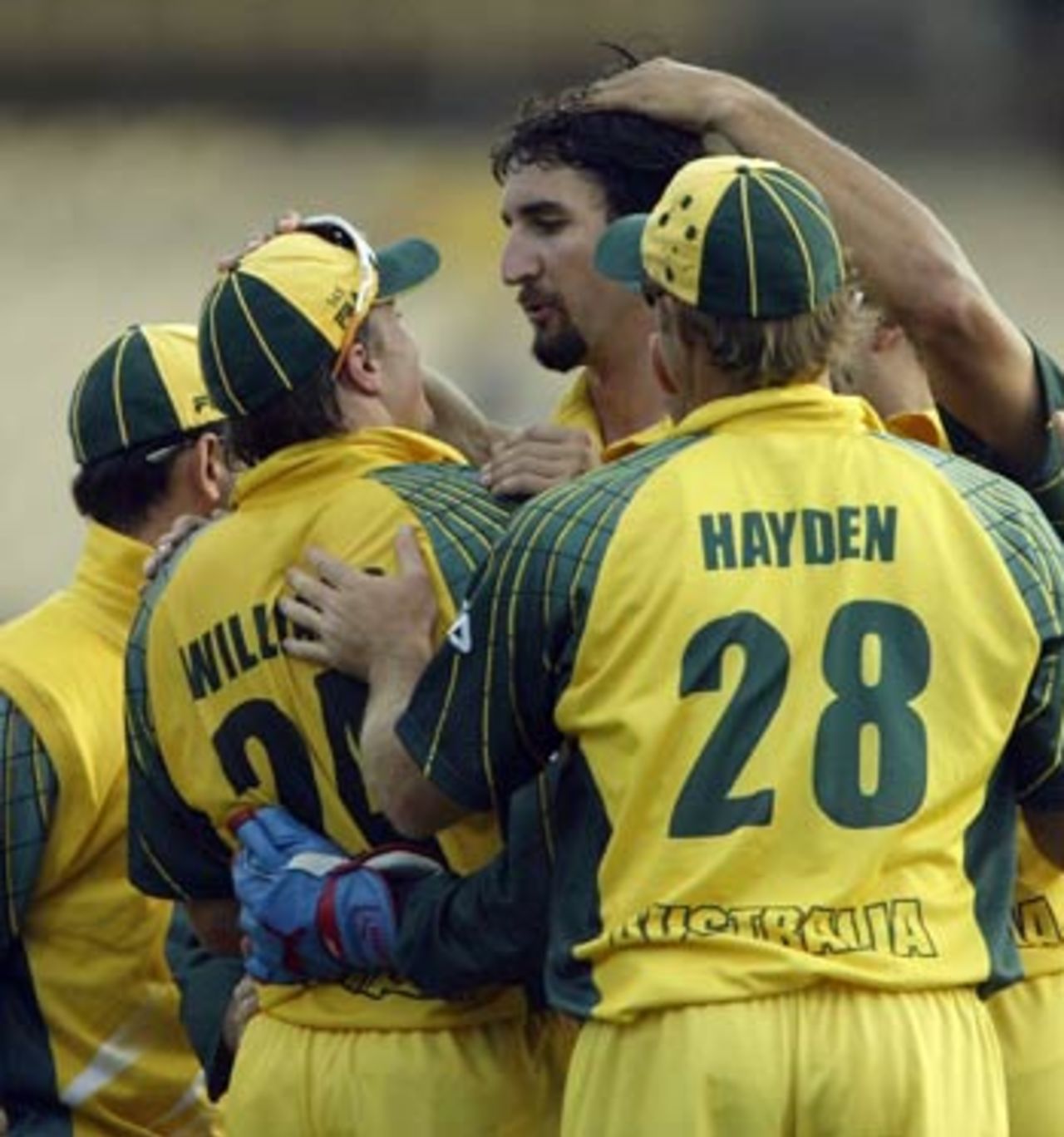 Jason Gillespie and Brad Williams congratulated after Vusi Sibanda's dismissal, Australia v Zimbabwe, VB Series, 2nd ODI, Sydney, January 11, 2004