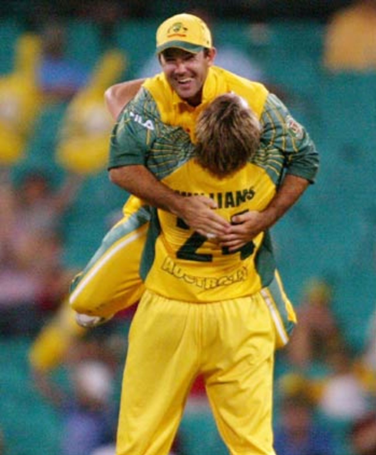 Brad Williams hugged by a delighted Ricky Ponting after Australia wrap up the match, Australia v Zimbabwe, VB Series, 2nd ODI, Sydney, January 11, 2004
