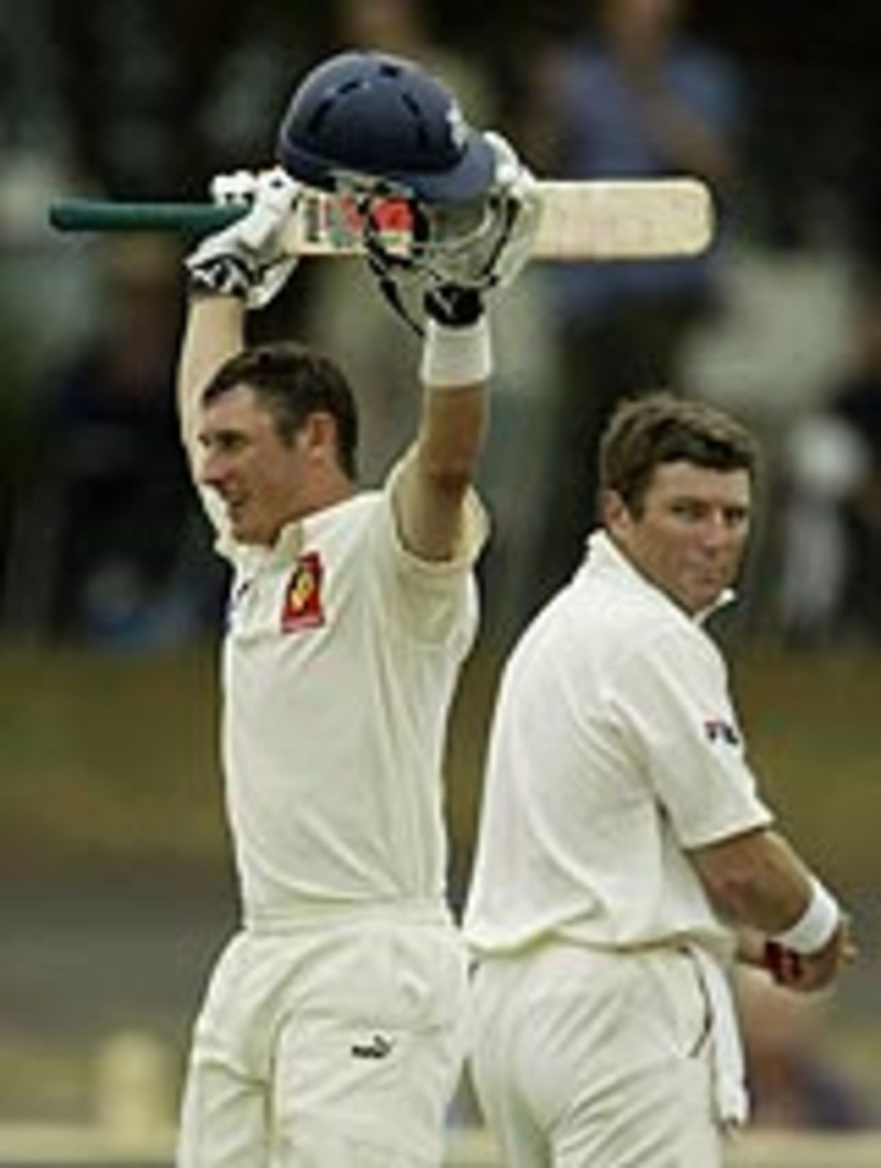 Stuart MacGill looks on as David Hussey celebrates an amazing victory for Victoria over NSW, Pura Cup, January 12
