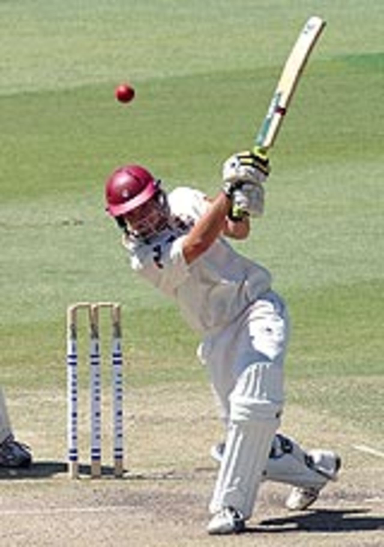 Nathan Hauritz hits out during his career-best 94 for Queensland, v Western Australia, Perth, January 13, 2004