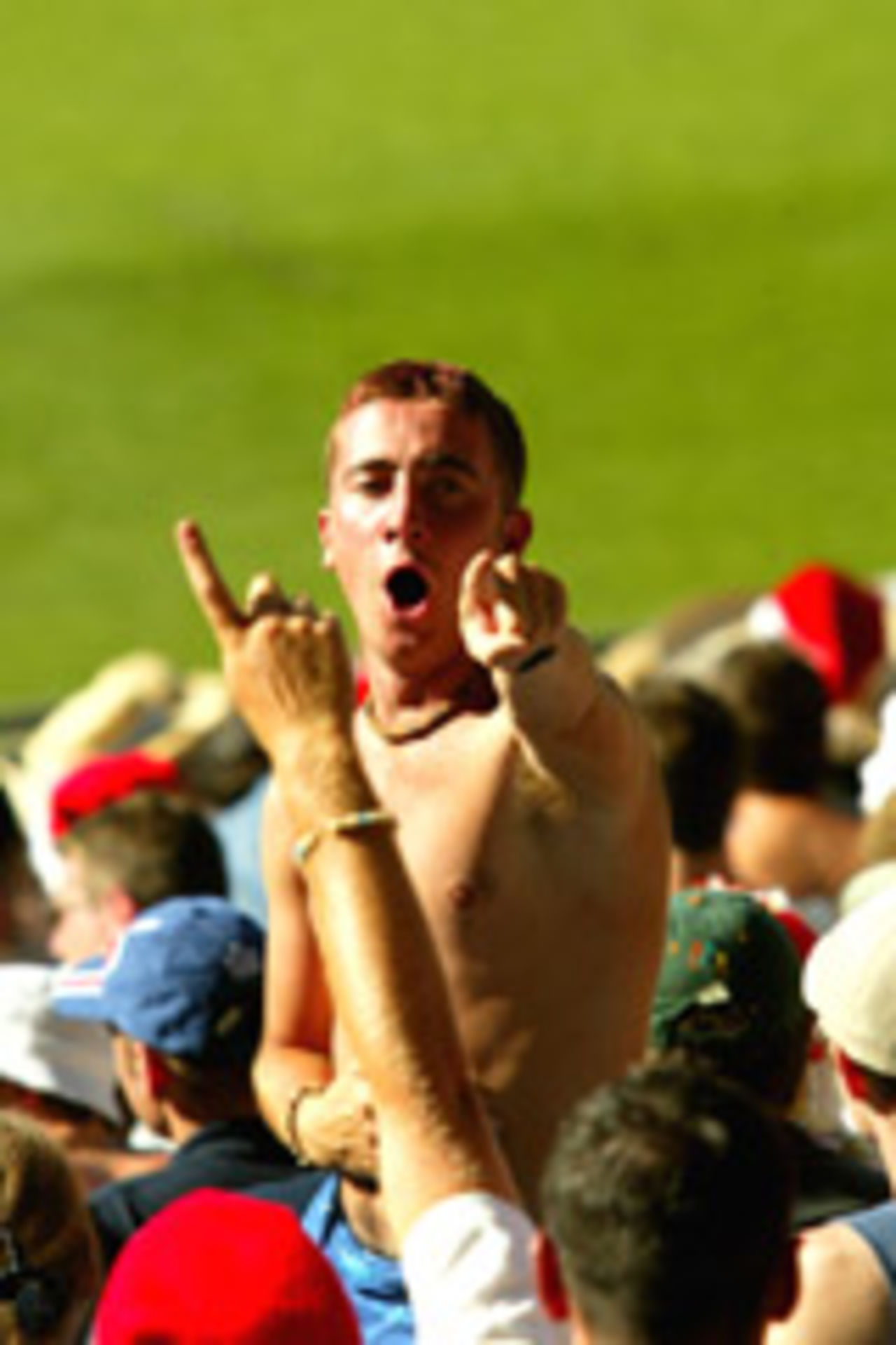 English and Australian fans have a go at each other at Melbourne, December 6, 2002