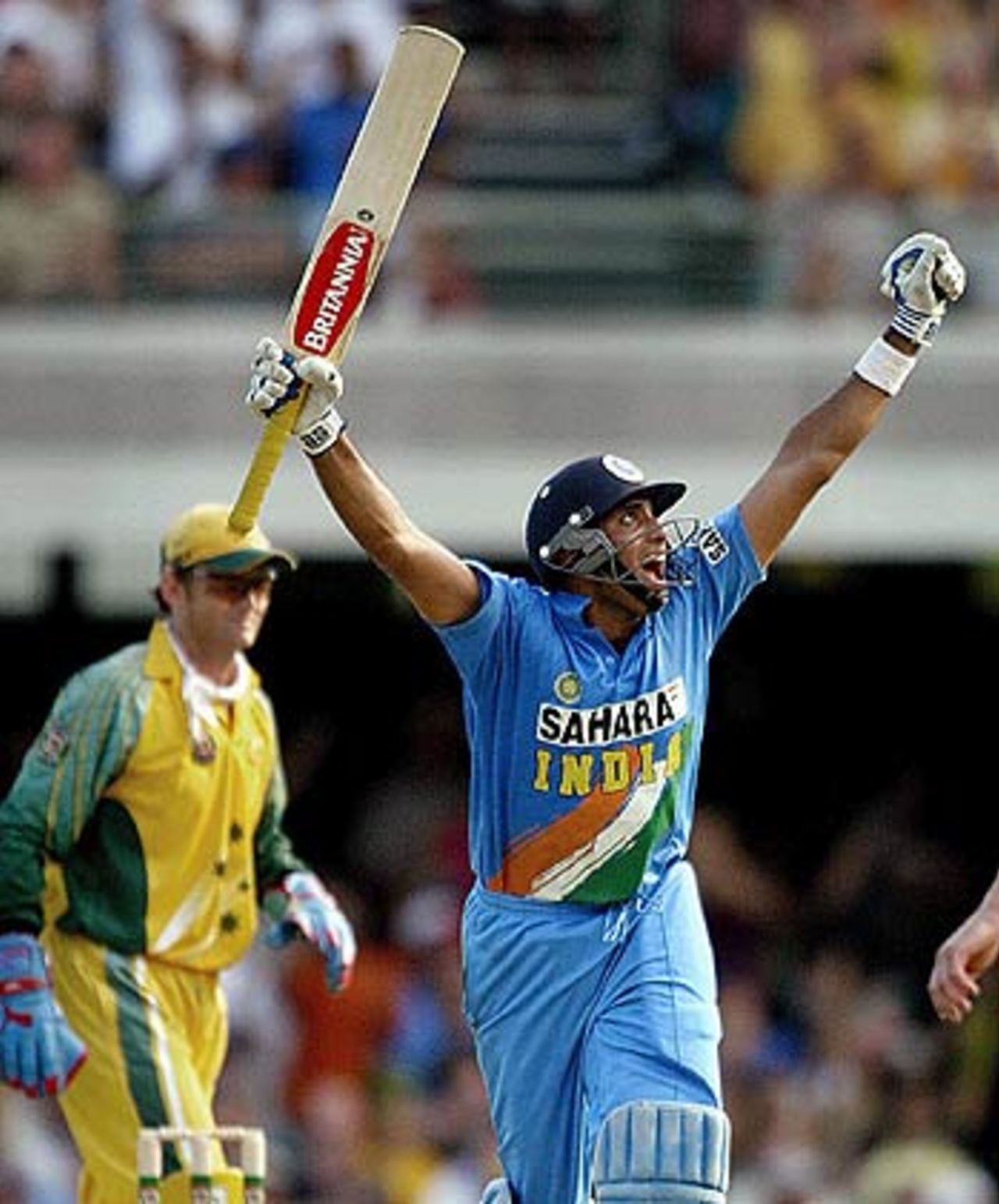 VVS Laxman celebrates as he reaches his century off the last ball of the innings, Australia v India, VB Series, Brisbane, 5th ODI, January 18, 2004