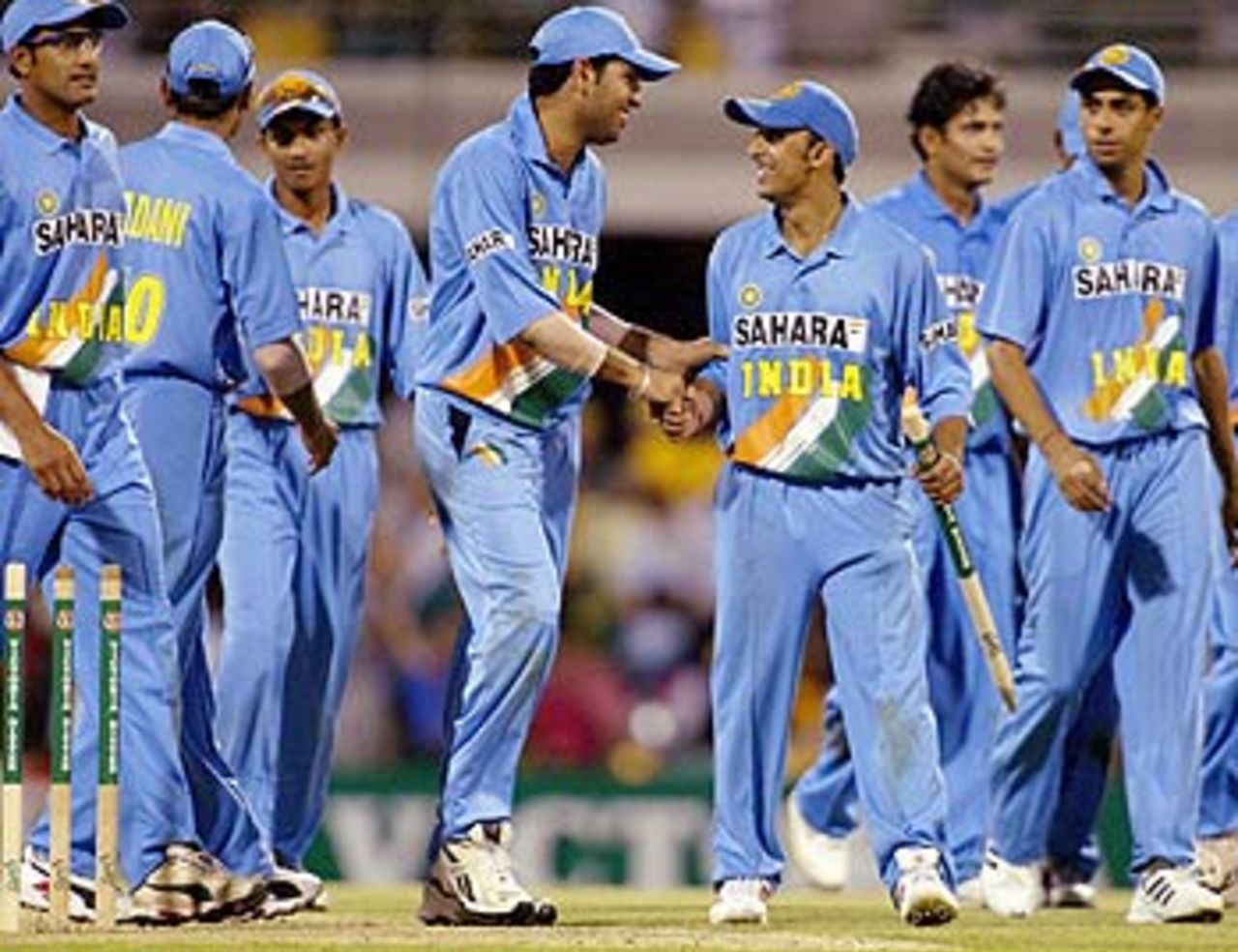 Start the way you mean to go on. Rohan Gavaskar walks off after a happy debut surrounded by some satisfied men, Australia v India, VB Series, Brisbane, 5th ODI, January 18, 2004