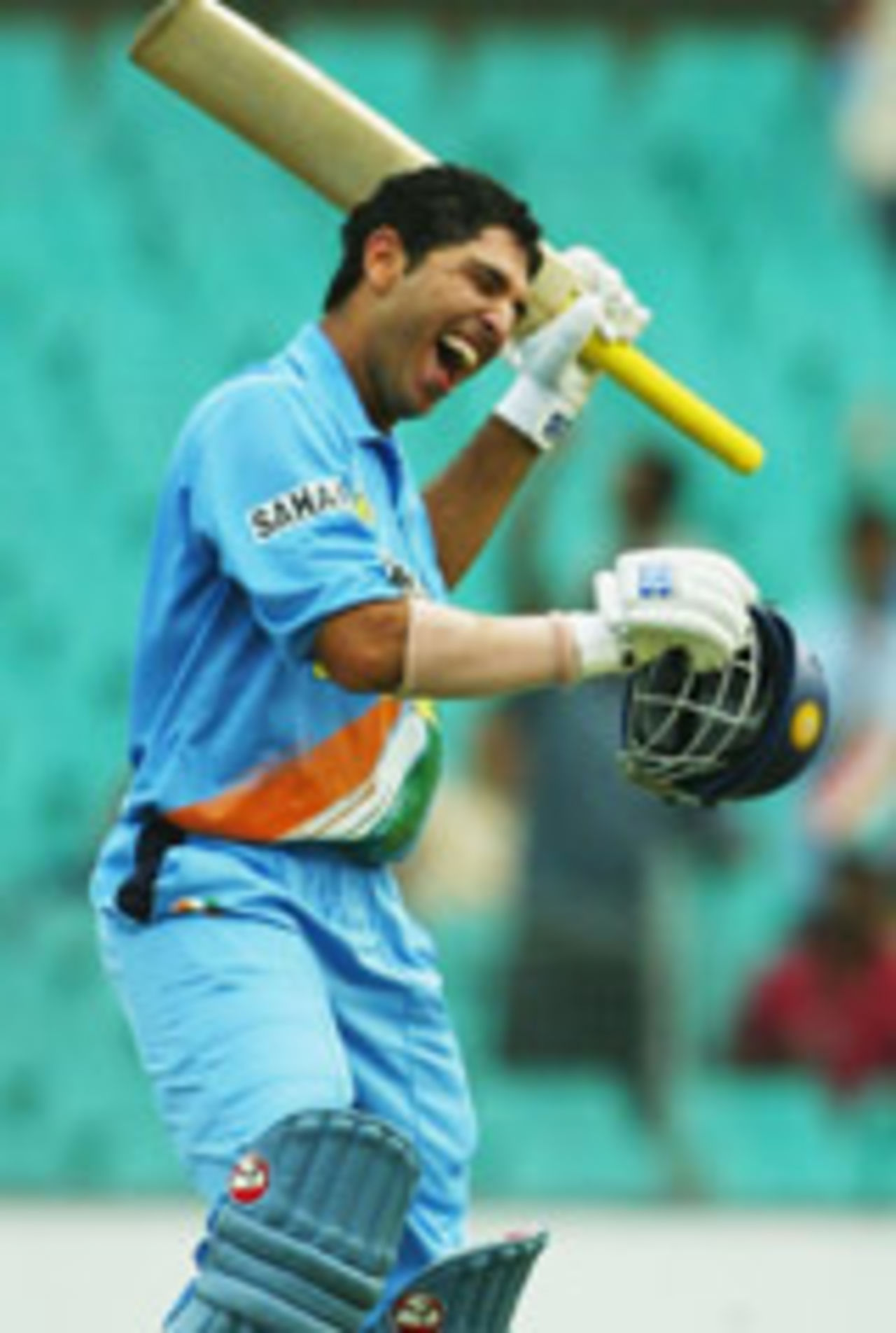 Yuvraj Singh punches the air after his century, Australia v India, VB Series, 7th ODI, Sydney, January 22, 2004