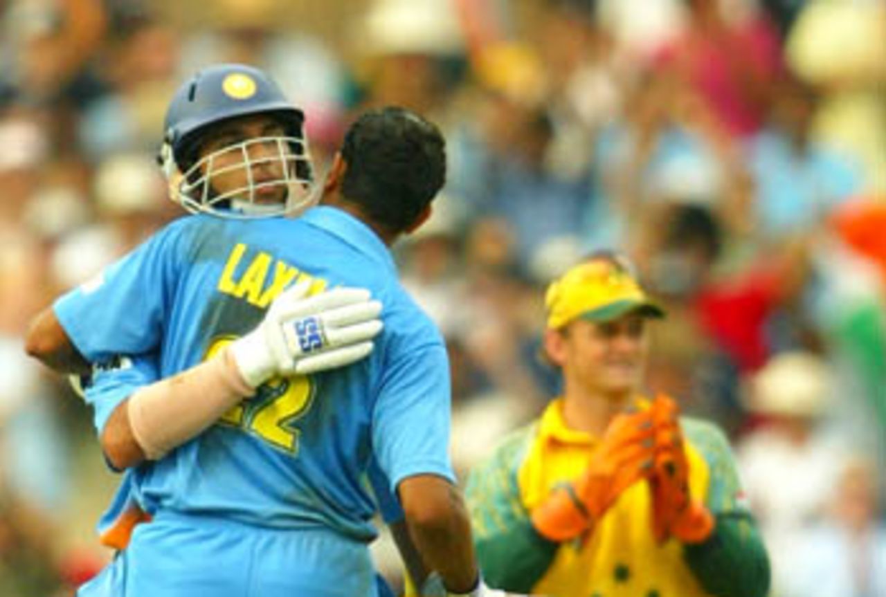 Yuvraj Singh gives his partner, VVS Laxman, a hug for reaching a century, Australia v India, VB Series, 7th ODI, Sydney, January 22, 2004