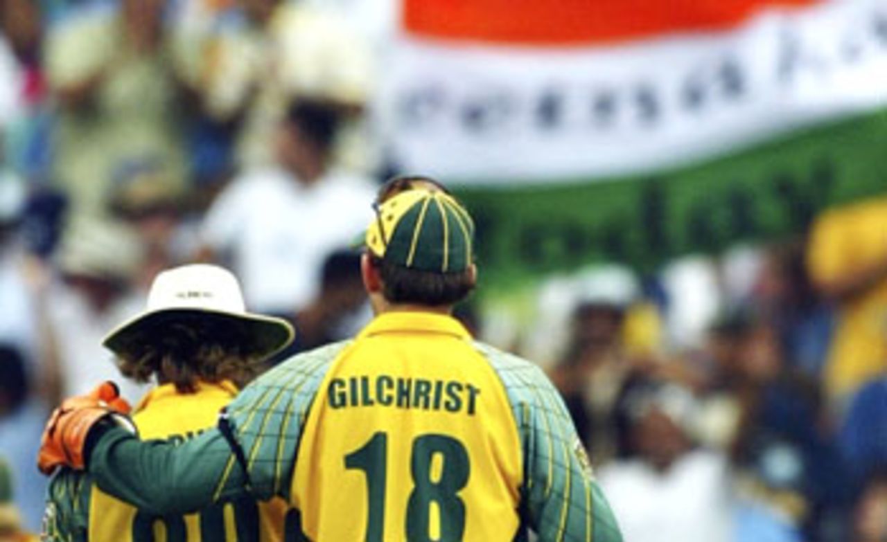 Adam Gilchrist puts a comforting arm around Ian Harvey after an expensive last over worth 22 runs, Australia v India, VB Series, 7th ODI, Sydney, January 22, 2004