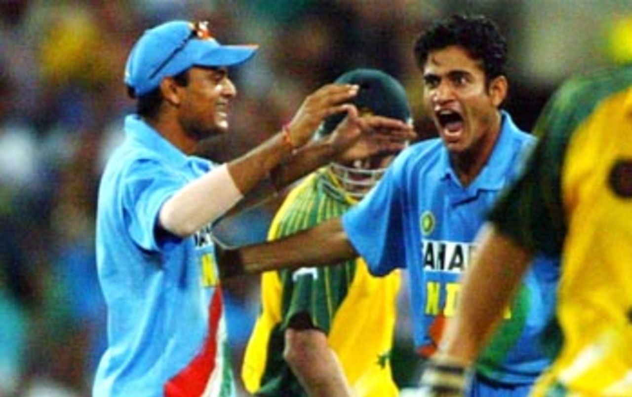 The storm is over, but only just: Irfan Pathan takes two wickets off two balls to make a potential rout a contest, Australia v India, VB Series, 7th ODI, Sydney, January 22, 2004
