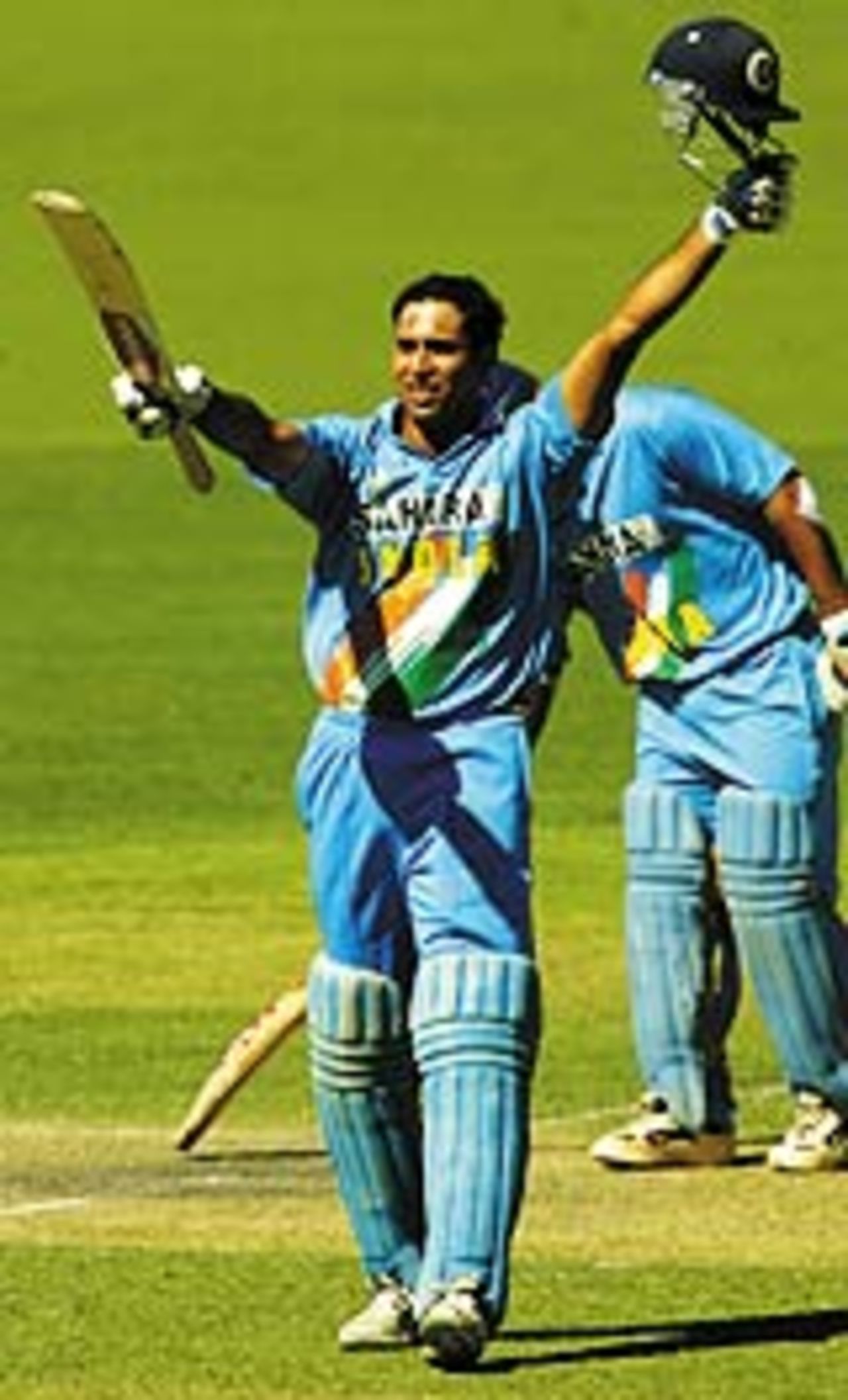 VVS Laxman acknowledges the applause after reaching his hundred, India v Zimbabwe, VB Series, 8th ODI, Adelaide, January 24, 2004