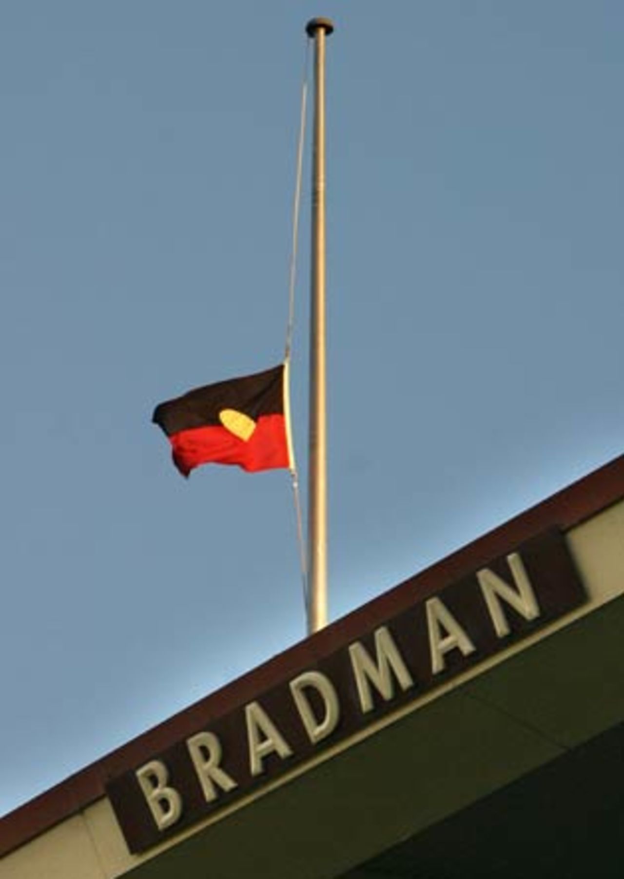 A flag flutters at half mast above the Bradman stands as the sun finally set on Zimbabwe, India v Zimbabwe, VB Series, 8th ODI, Adelaide, January 24, 2004