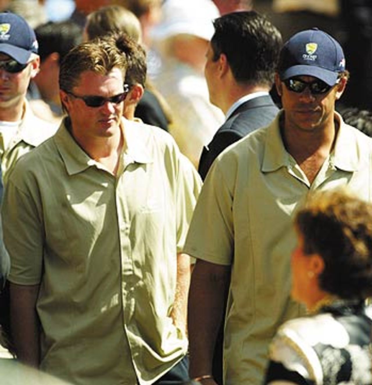 Andrew Symonds and Brad Williams make their way to the funeral service, Adelaide, January 27, 2004