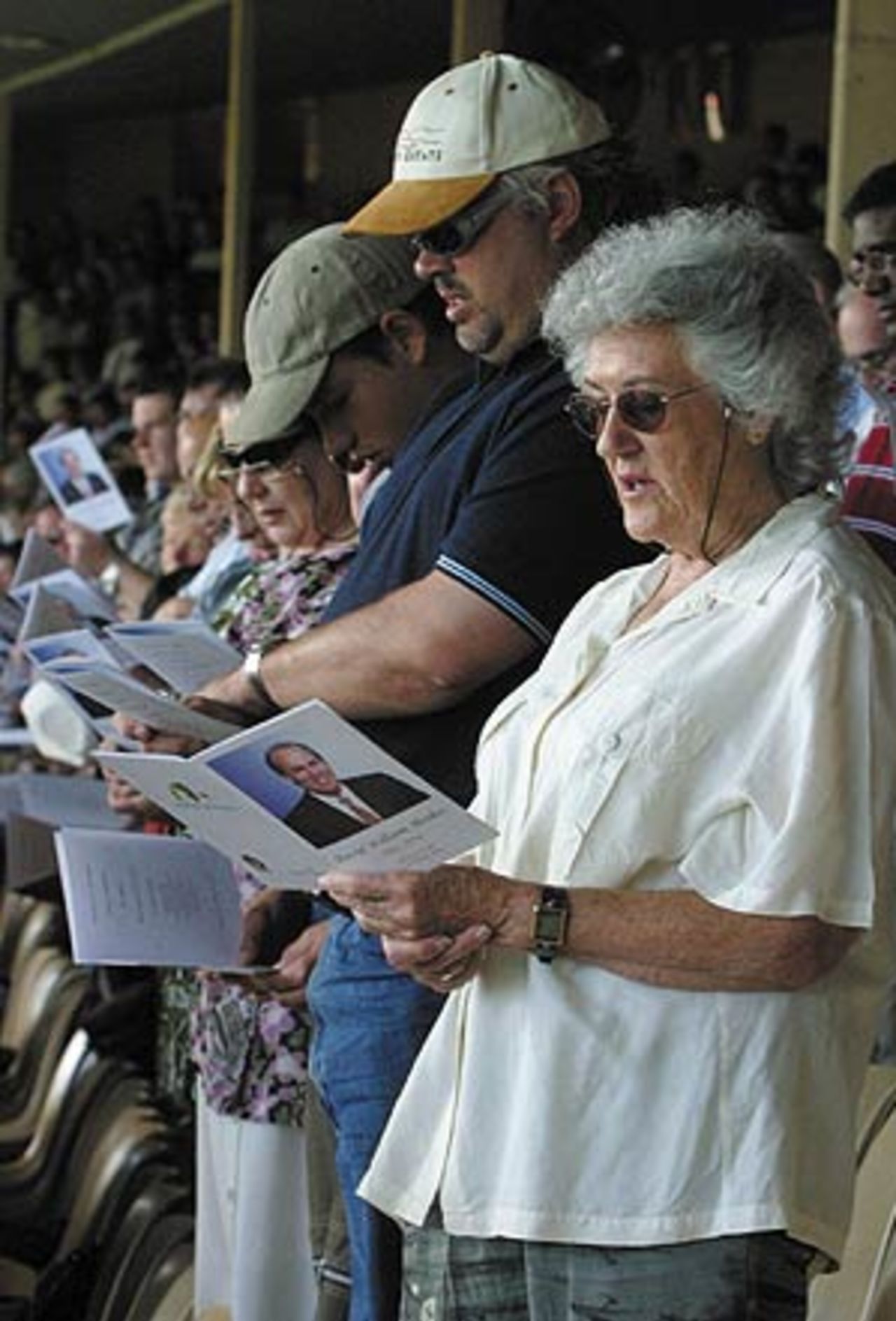 Mourners sing hyms during the funeral service, Adelaide, January 27, 2004