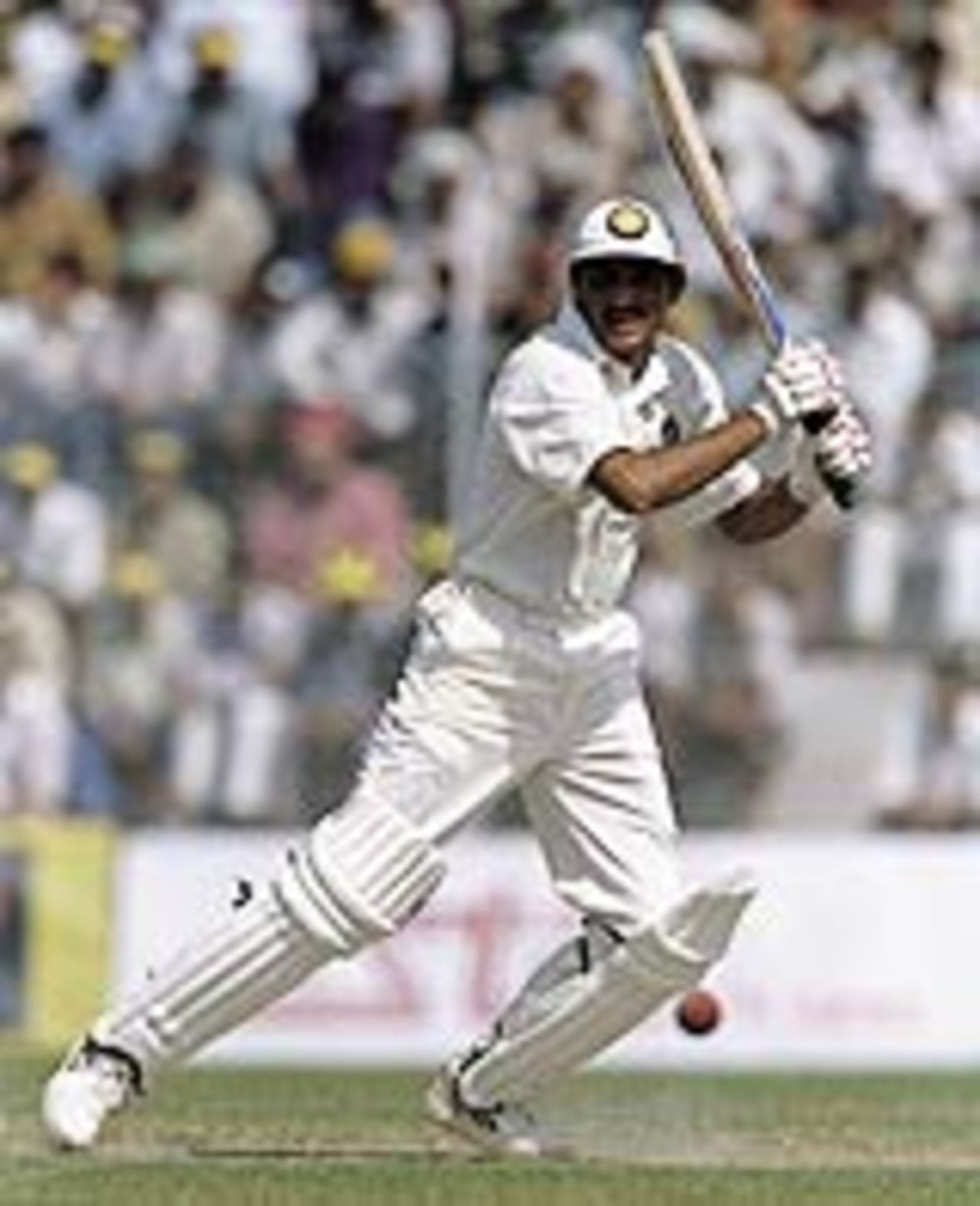 Mohammad Azharuddin drives through the off side, India v Australia, New Delhi, October 10, 1996