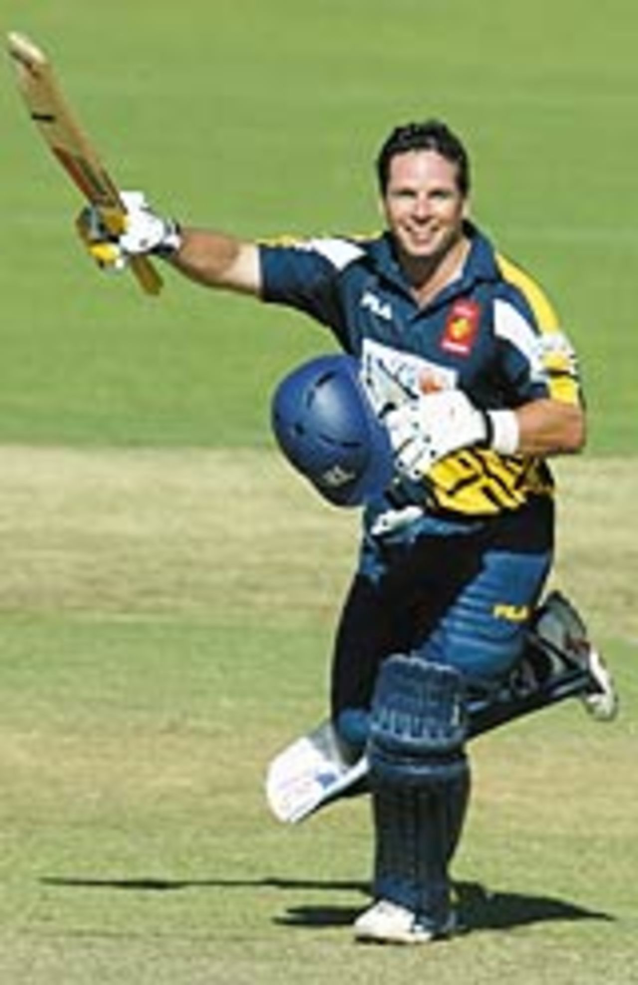 Brad Hodge of the Bushrangers reaches his century in the ING Cup, South Australia v Victoria, Adelaide Oval, January 30, 2004