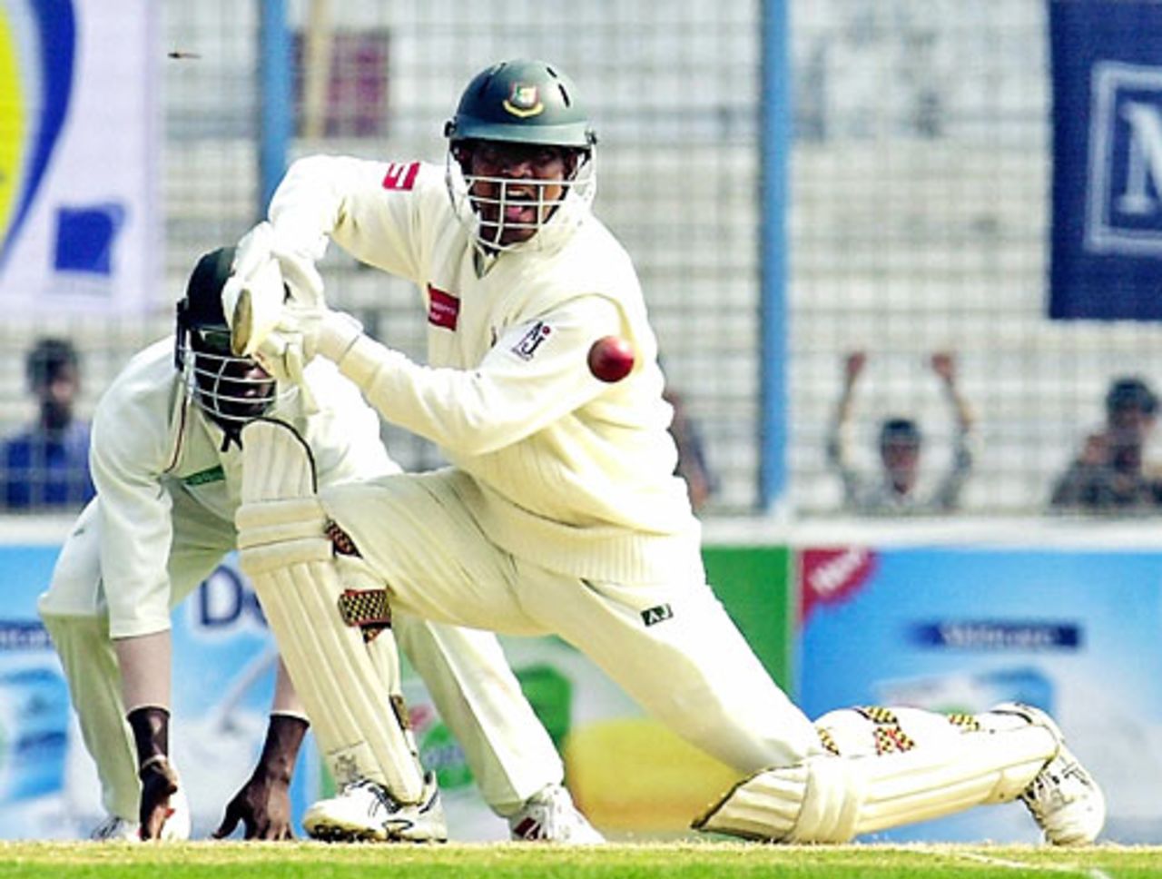 Mohammad Rafique guides the ball to the boundary, Bangladesh v Zimbabwe, 1st Test, Chittagong, 2nd day, January 7, 2005