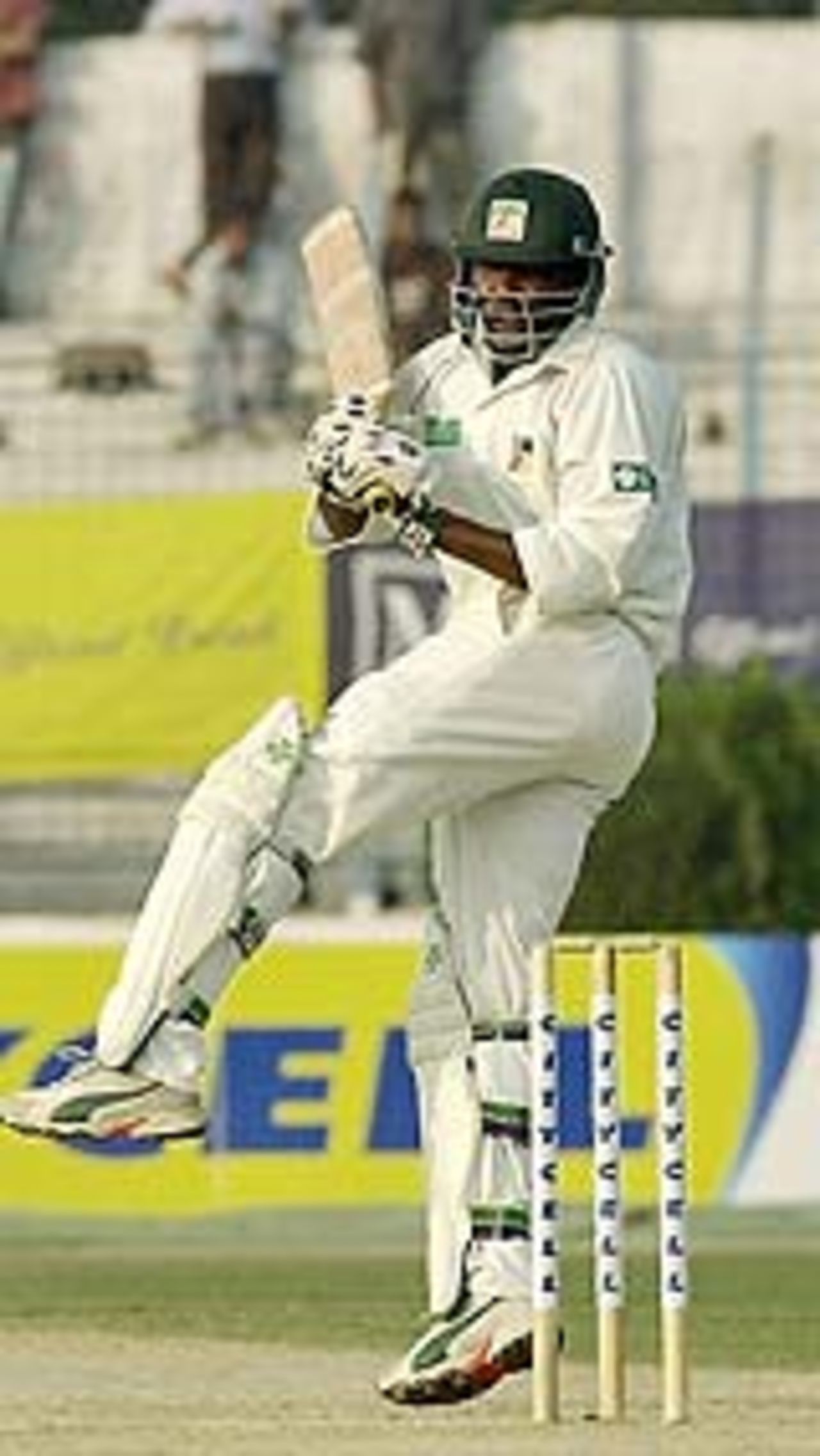 Hamilton Masakadza goes for the bowling, Bangladesh v Zimbabwe, 1st Test, Chittagong, 5th day, January 10, 2005