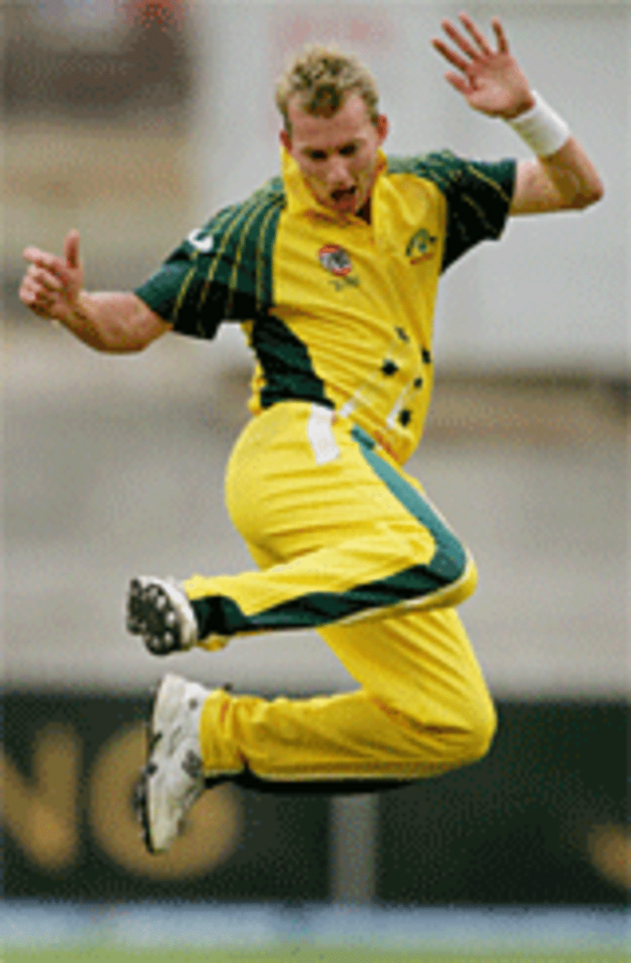 Brett Lee leaps with delight as he takes a wicket, Australia v West Indies, VB Series, January 14, 2005