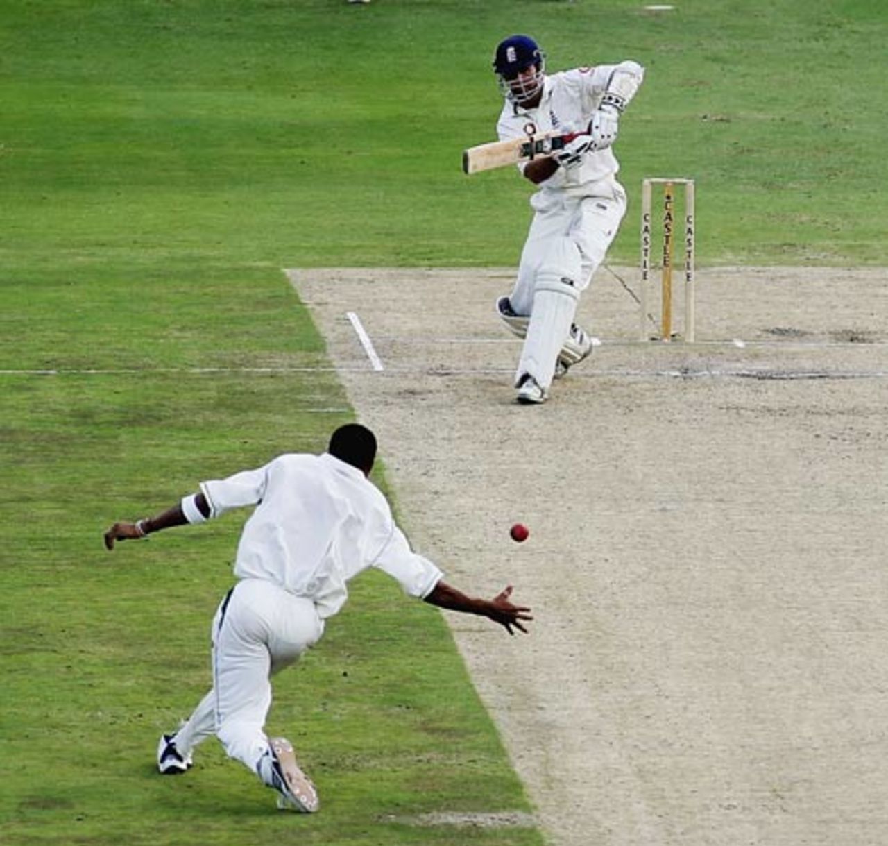 Michael Vaughan hammers the ball back past Makhaya Ntini, South Africa v England, 4th Test, The Wanderers, January 14, 2005