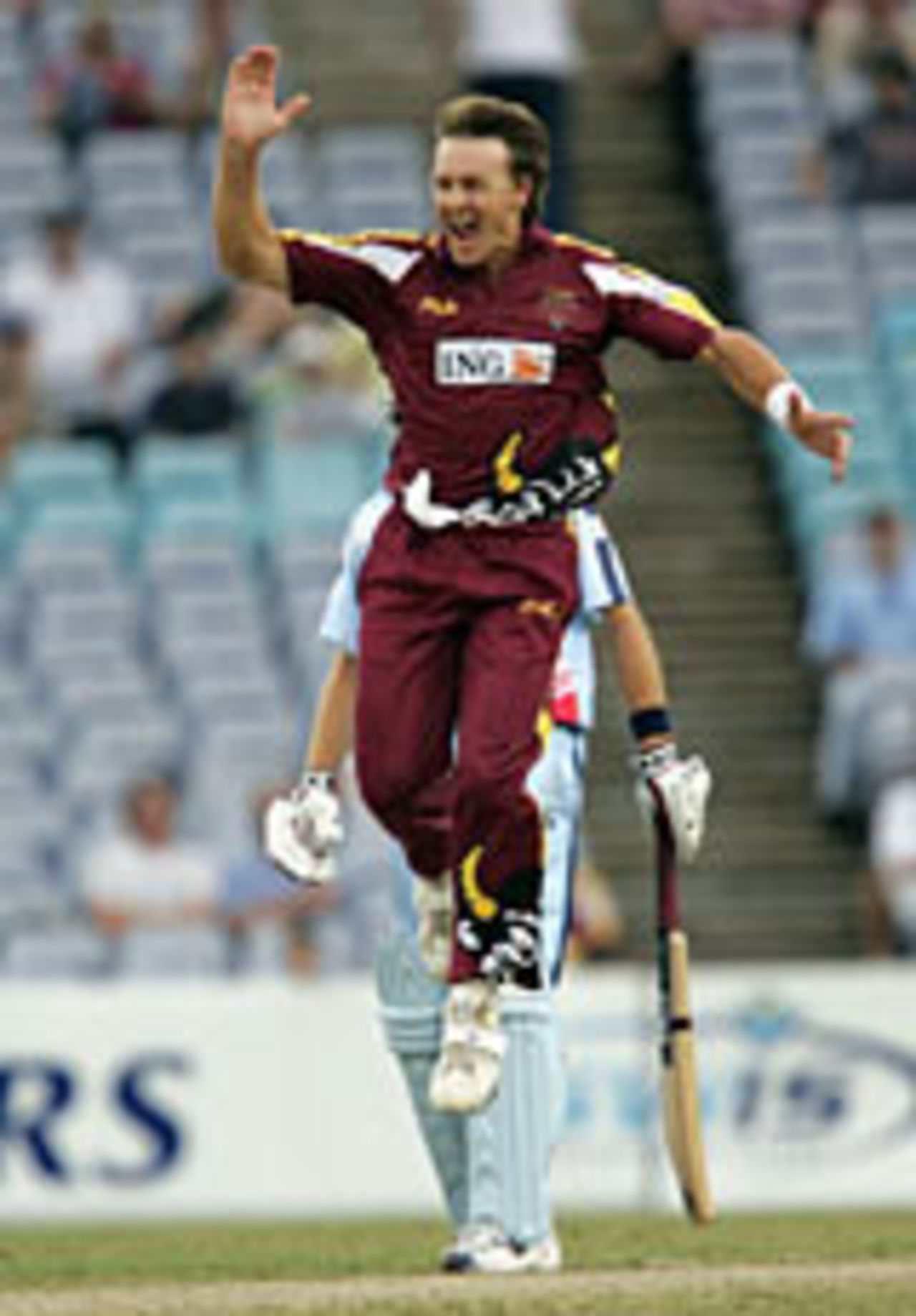Andrew Bichel leaps after dismissing Phil Jacques, NSW v Queensland, ING Cup, Sydney, January 15, 2005
