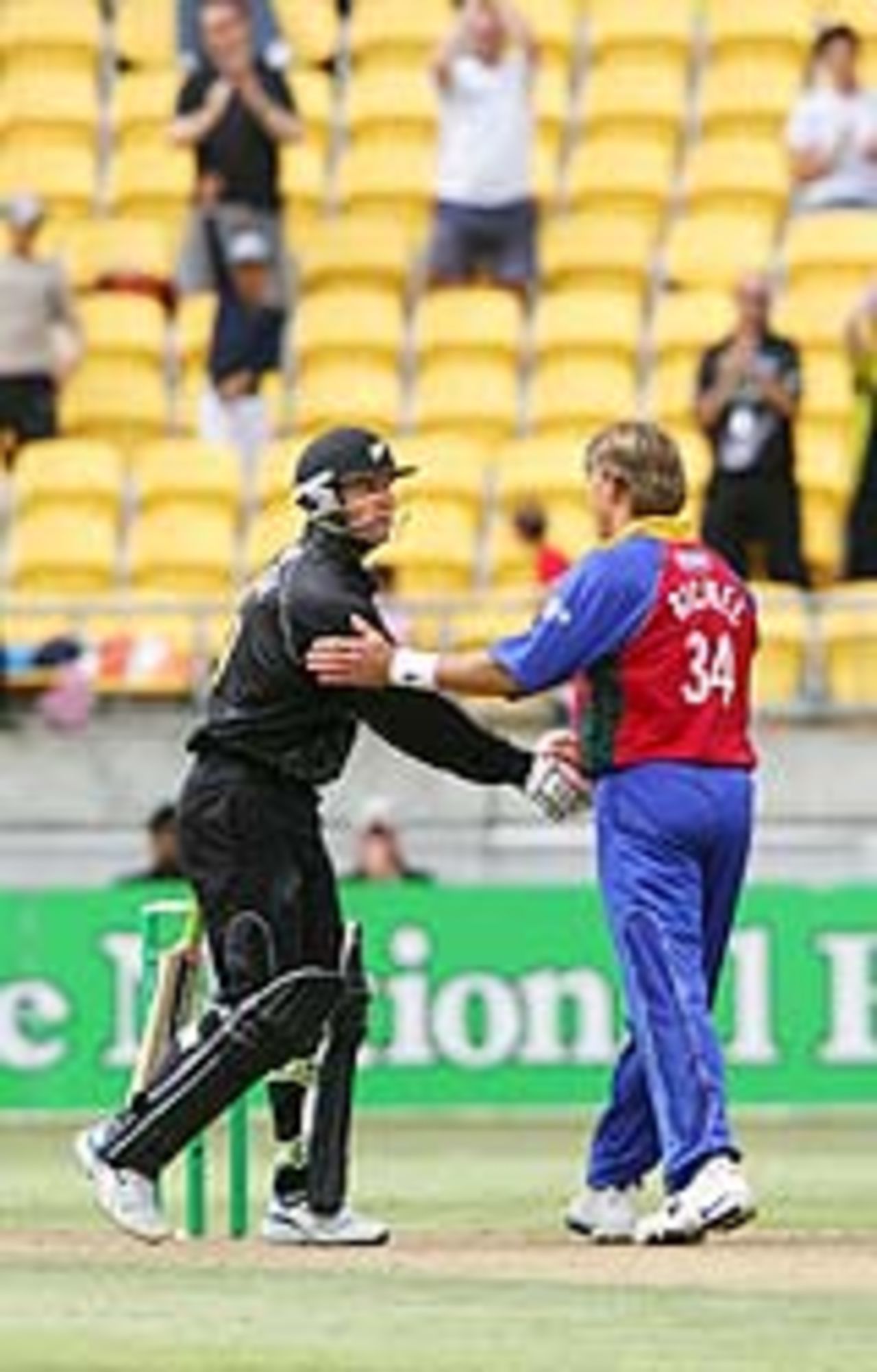 Nathan Astle is congratulated after reaching his hundred, New Zealand v FICA World XI, 2nd match, Wellington, January 24, 2005