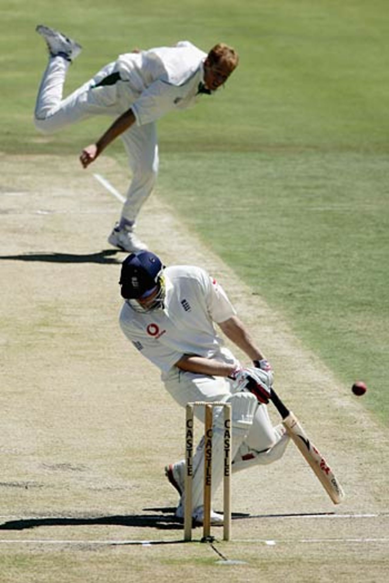 Andrew Flintoff ducks out of the way of a Shaun Pollock bouncer, South Africa v England, 5th Test, Centurion, January 24, 2005