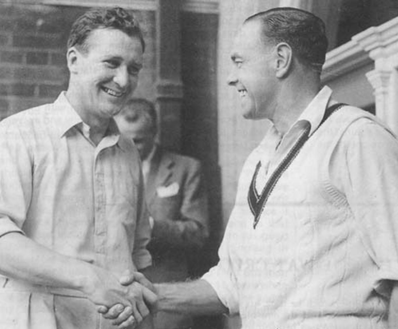 Jim Laker is congratulated by Ian Johnson after taking 19 wickets, England v Australia, Manchester, July 31, 1956