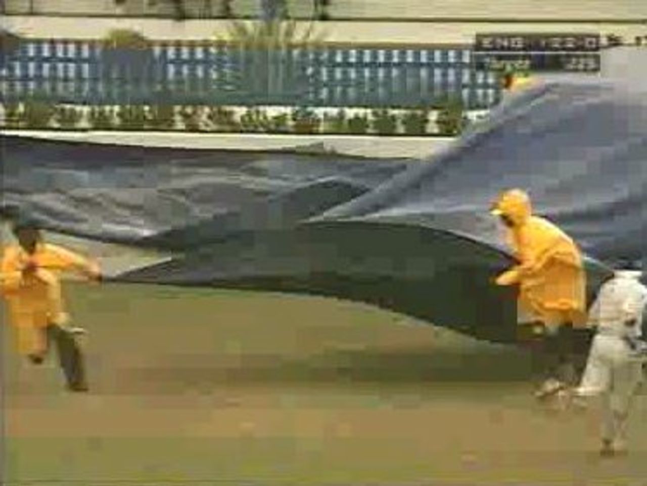Test 3, West Indies v England at Port of Spain 4th day, 1st session Ground staff rush to put on the covers as rain threatens England's hopes of victory