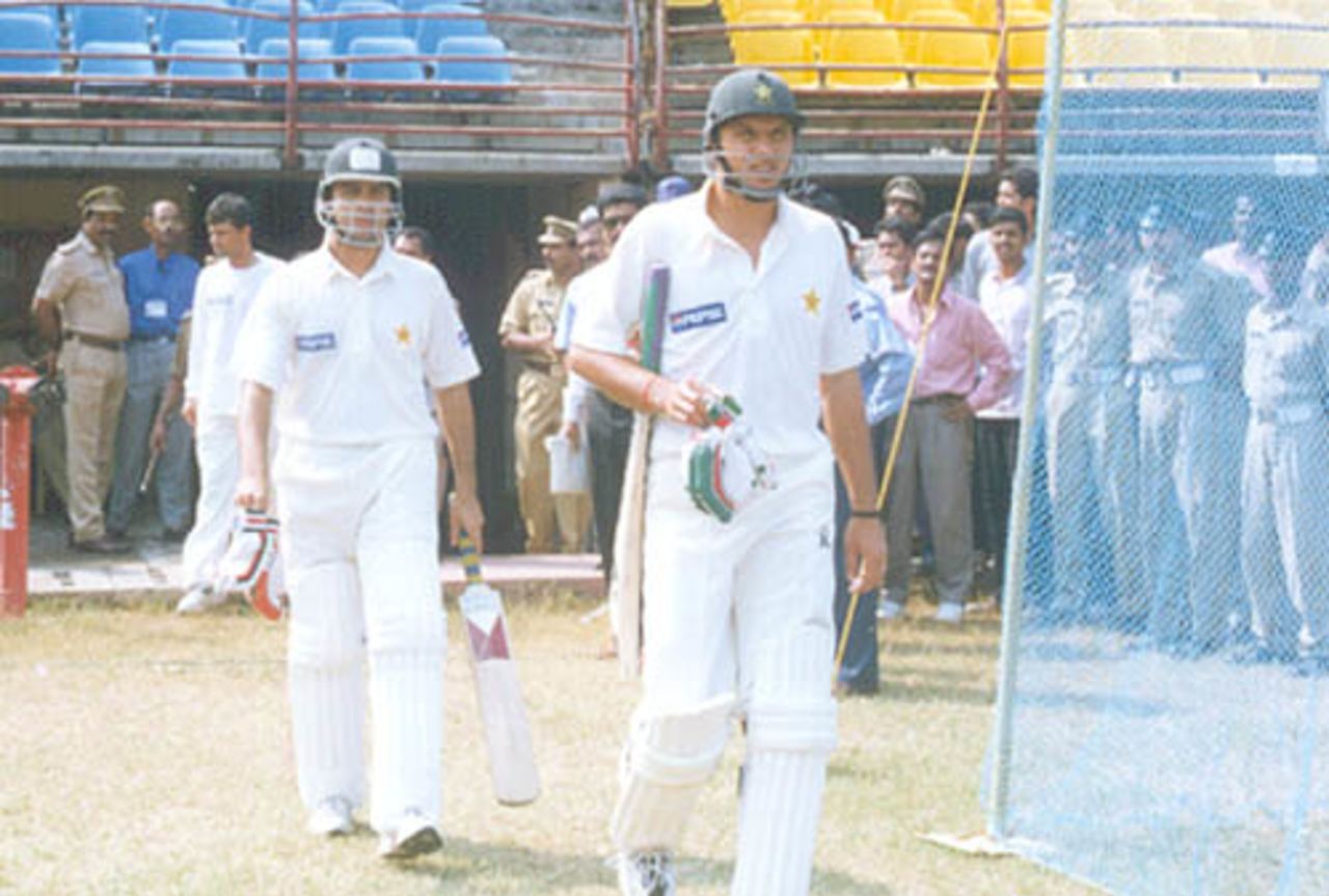 Pakistani opening batsmen Shahid Afridi and Naved Ashraf going in to bat, Board President's XI v  Pakistan, Day 1, Kochi