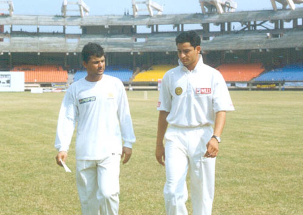 Captains Hrishikesh Kanitkar and Moin Khan returning after toss, Board President's XI v  Pakistan, Day 1, Kochi