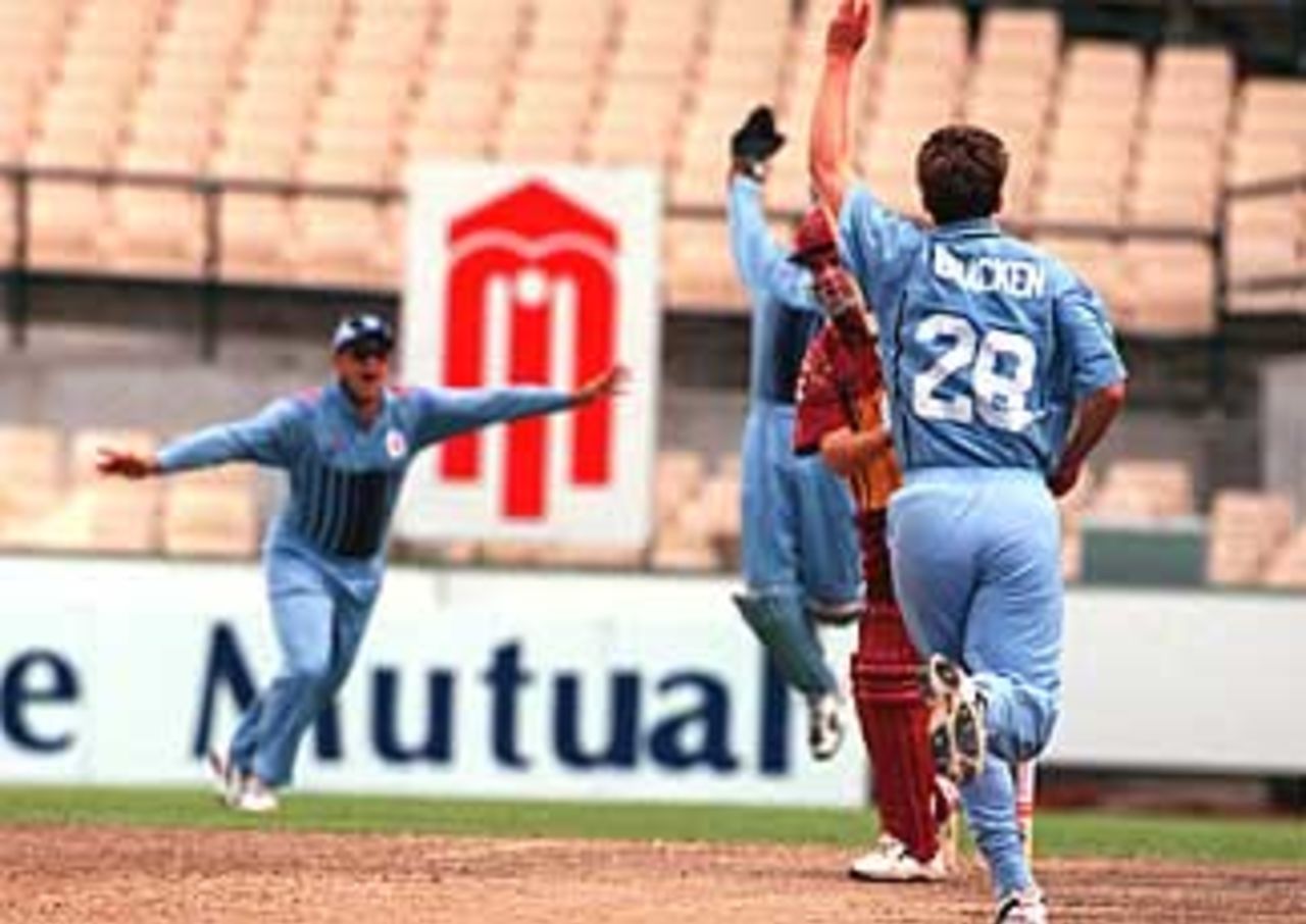 Nathan Bracken takes one of his 4 wickets during the second Mercantile Mutual Cup Semi Final at the Sydney Cricket Ground, 21 February 1999