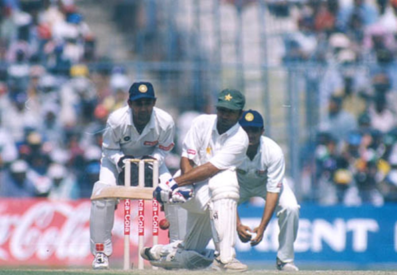 Saeed Anwar sweeps as Mongia looks on, India v Pakistan, Asia Test Championship, Eden Gardens, Calcutta, 16-20