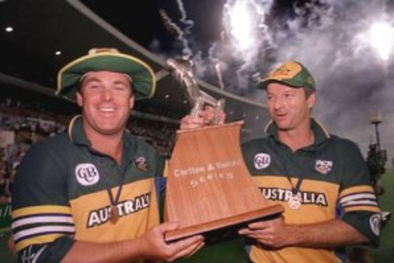 4 Feb 2000: Shane Warne (left) , vice captain, and Stephen Waugh, captain of the Australian one day cricket side, enjoy the celebrations following their victory over Pakistan in the Carlton and United Breweries one day international second final at the Sydney Cricket Ground, Sydney, Australia.
