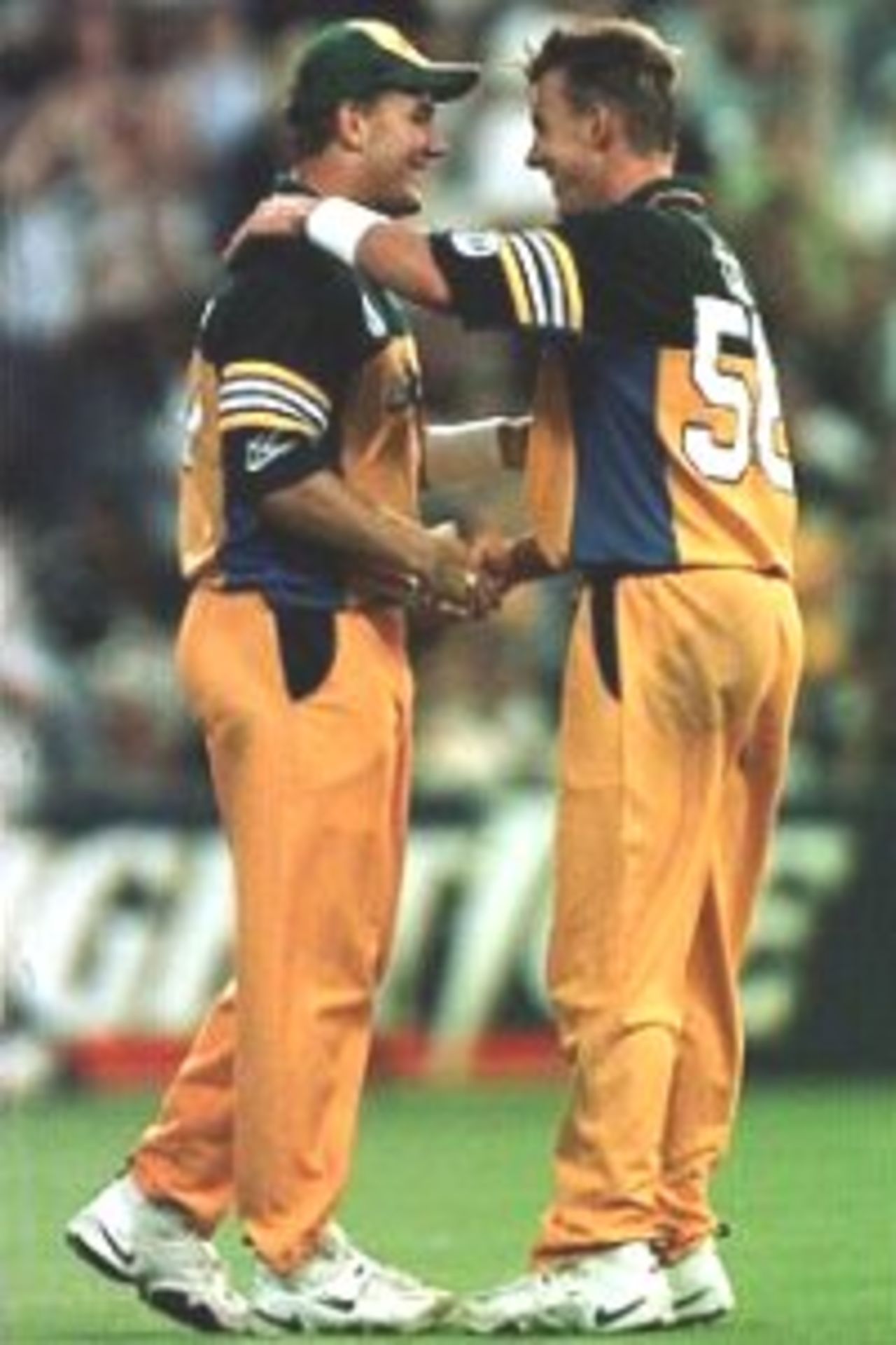 4 Feb 2000: Shane Lee ( Left ) is congratulated by his brother Brett Lee after he caught out Azhar Mahmood of Pakistan off Brett Lee's bowling for 27 during the Carlton and United Breweries one day international between Australia and Pakistan at the Sydney Cricket Ground, Sydney, Australia.