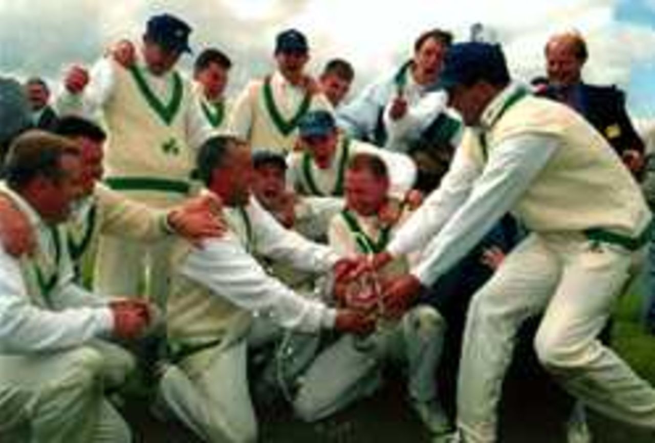 Ireland players celebrate their Benson & Hedges Cup victory over Middlesex, Dublin 1997