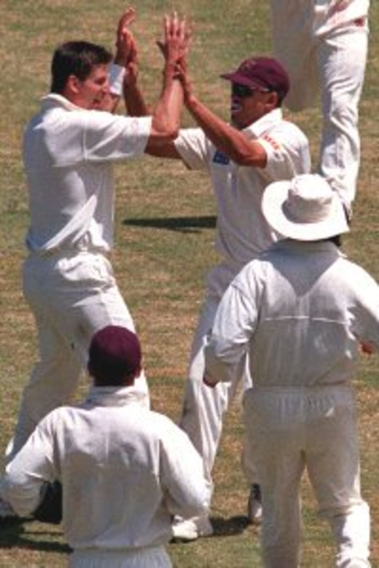 20 Nov 1999: Michael Kasprowicz of Queensland celebrates the wicket of Greg Mail of New South Wales caught by Martin Love for five during day two of the Pura Milk Cup at the Sydney Cricket Ground, Sydney, Australia.