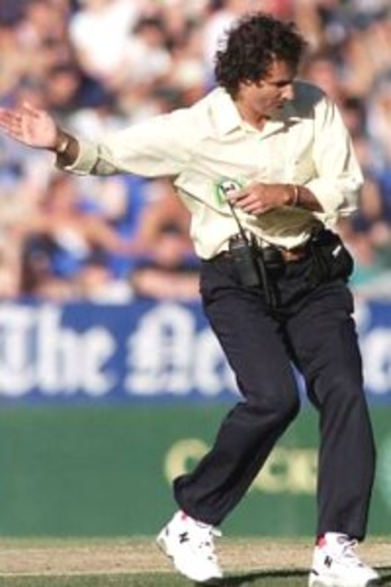 19 Feb 2000: Umpire Brent Bowden signals a four with an unusual style, during the second one day international between New Zealand and Australia at Eden Park, Auckland, New Zealand.