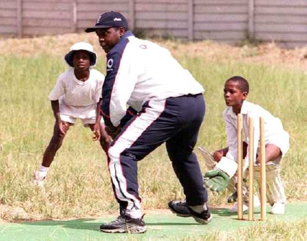 Mark Alleyne batting during a coaching session at Chipembere Primary School, Highfield, Harare This event was organized to mark the sponsorship of schools cricket in Zimbabwe by CricInfo