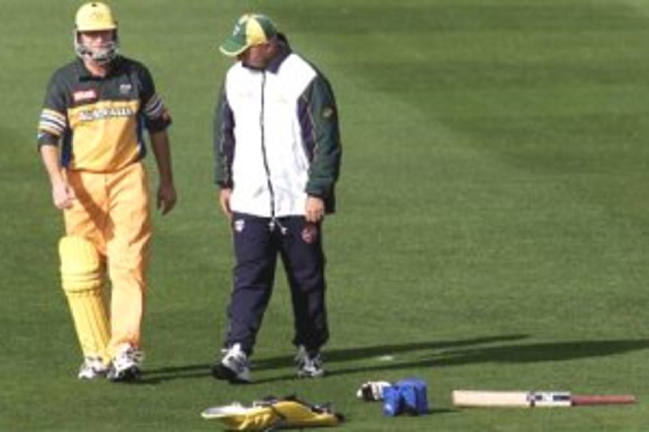 23 Feb 2000: Steve Waugh of Australia with Physio Pat Farhart leaves the field injured after being struck by a delivery from Chris Cairns of New Zealand, during the third one day international between New Zealand and Australia at Carisbrook, Dunedin, New Zealand.