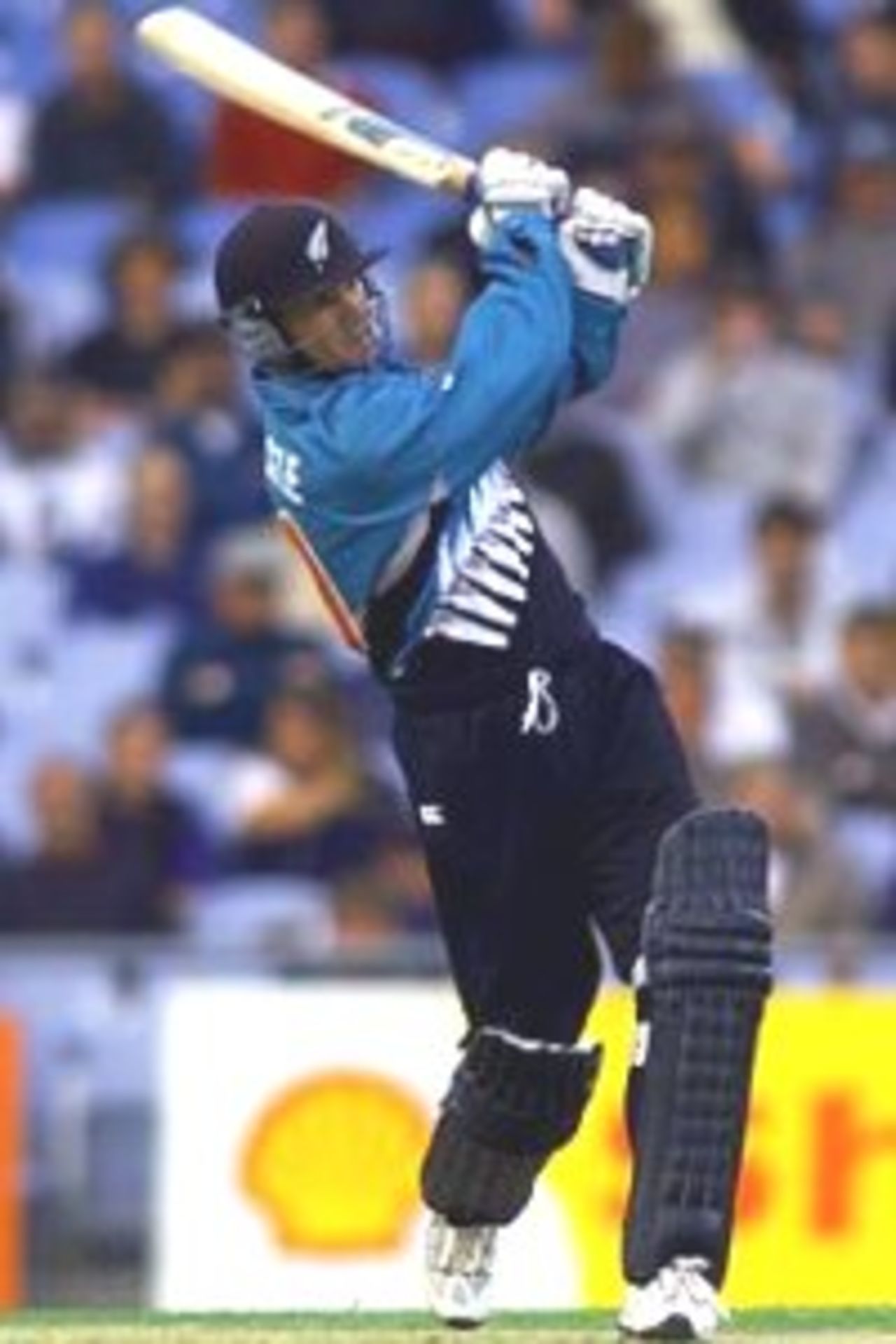 23 Feb 2000: Nathan Astle of New Zealand hits out off the bowling of Andrew Symonds of Australia, during the third one day international between New Zealand and Australia at Carisbrook, Dunedin, New Zealand.