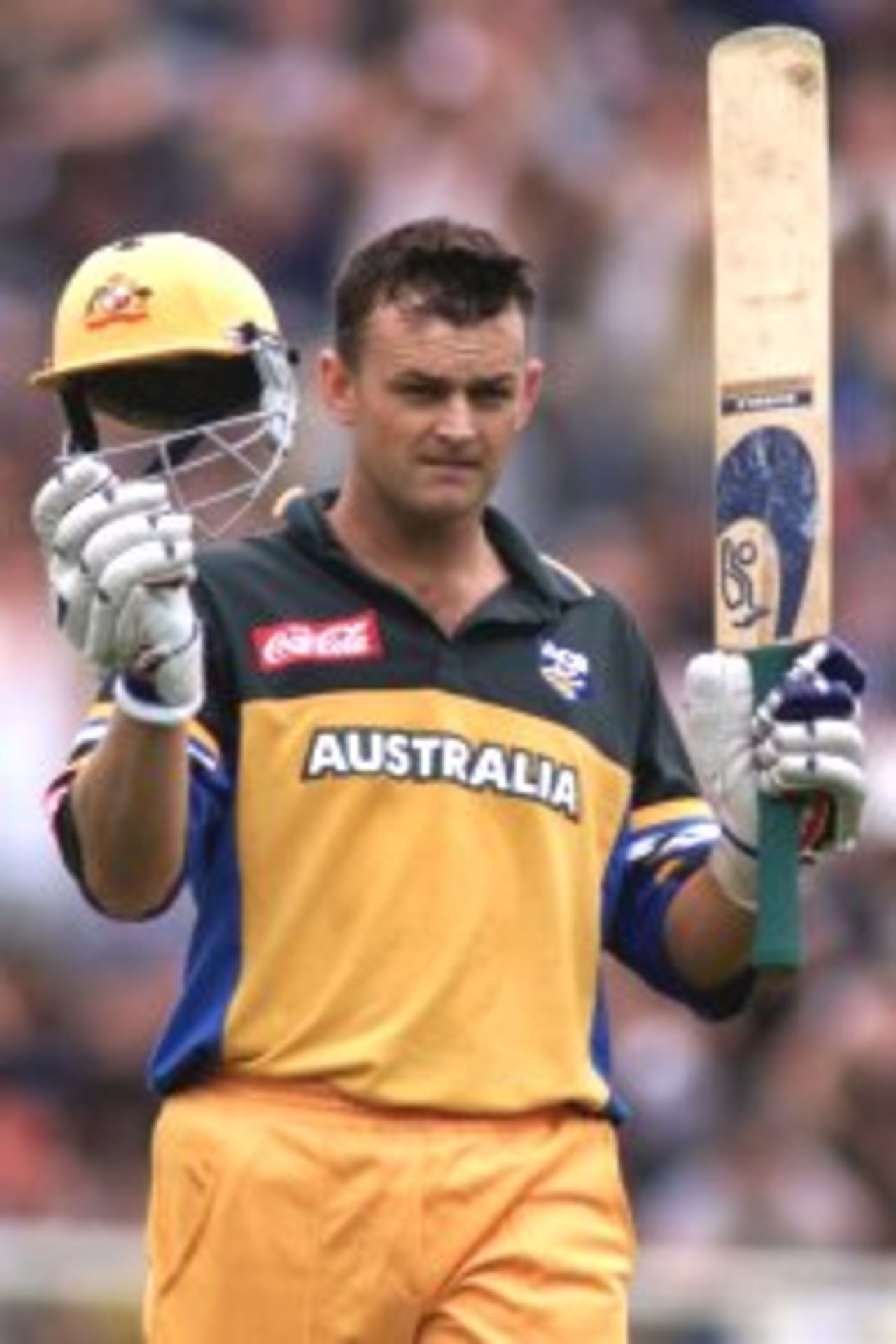 26 Feb 2000: Adam Gilchrist of Australia celebrates his century. Gilchrist went on to score 128, during the fourth one day international between New Zealand and Australia at Jade Stadium, Christchurch, New Zealand.