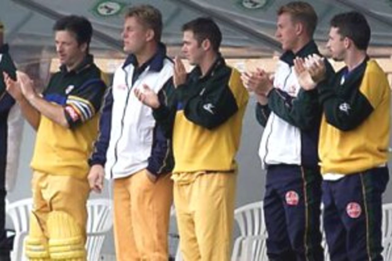 26 Feb 2000: The Australian team applaud the innings of Adam Gilchrist of Australia. Gilchrist scored 128, during the fourth one day international between New Zealand and Australia at Jade Stadium, Christchurch, New Zealand.