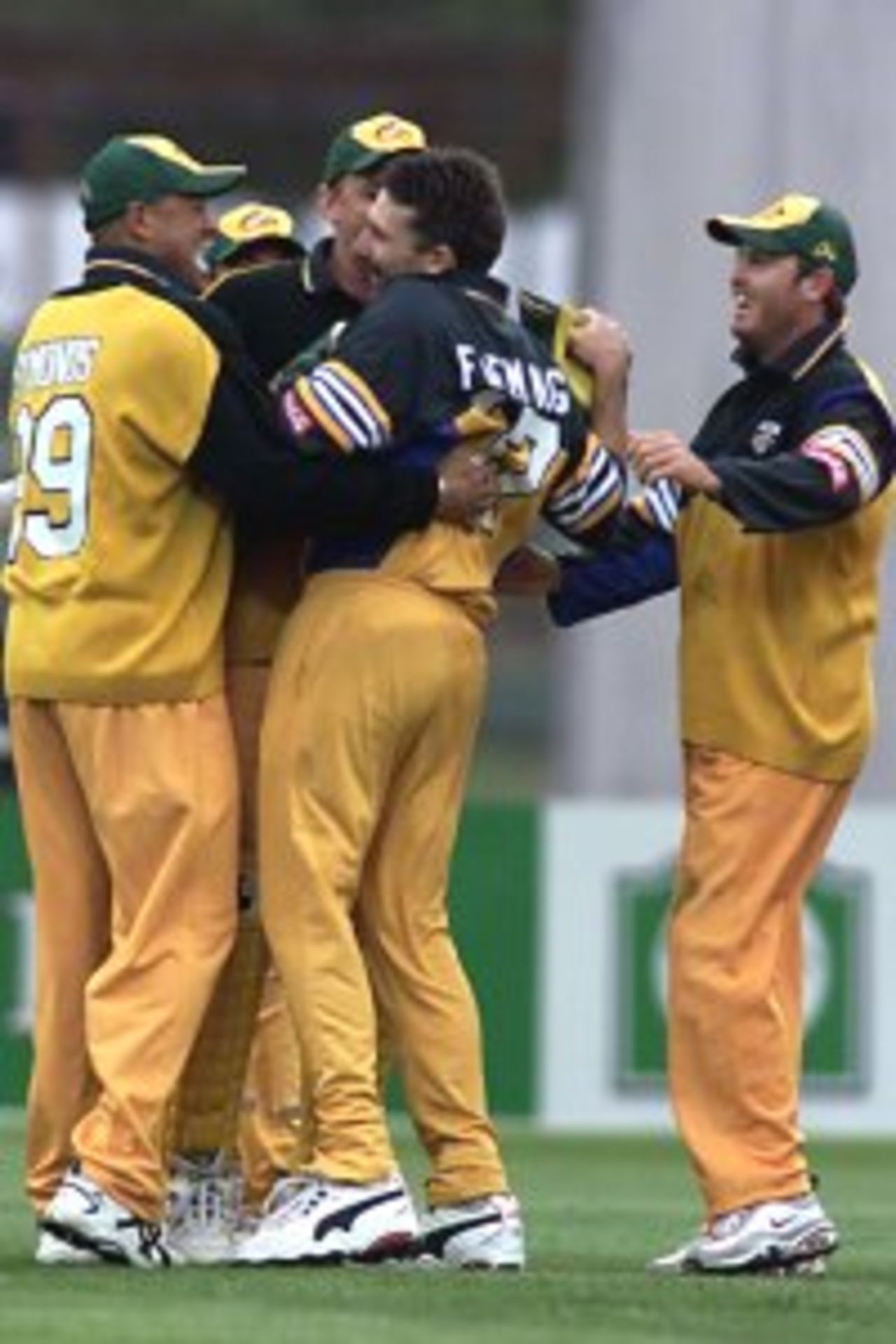 26 Feb 2000: Adam Gilchrist of Australia hits one of his seven sixes, this one of the bowling of Daniel Vettori of New Zealnd. Adam Parore of New Zealand looks on.Gilchrist went on to score 128, during the fourth one day international between New Zealand and Australia at Jade Stadium, Christchurch, New Zealand.