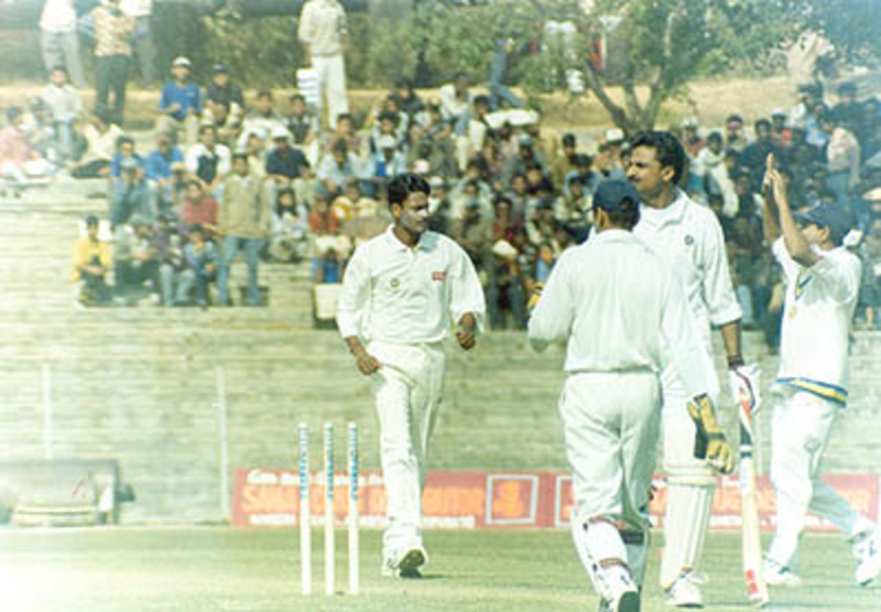 Debashish Mohanty cleans up Javagal Srinath in the first innings, Duleep Trophy, 2000/01, East Zone v South Zone, Maharaja Bir Bikram College Stadium, Agartala, 25-27 January 2001.