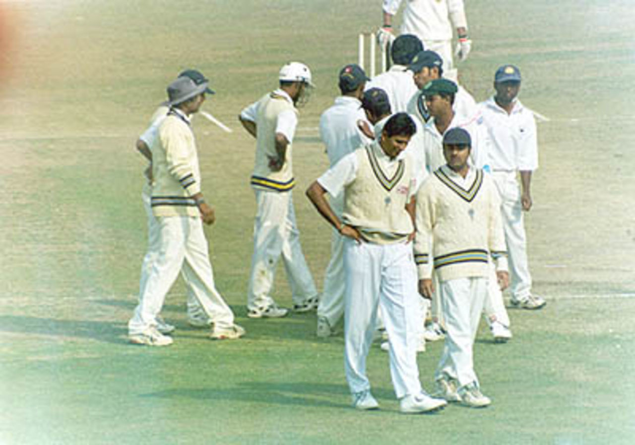 Prasad chats with AR Kapoor after dismissing Sanjay Raul, Duleep Trophy, 2000/01, East Zone v South Zone, Maharaja Bir Bikram College Stadium, Agartala, 25-27 January 2001.